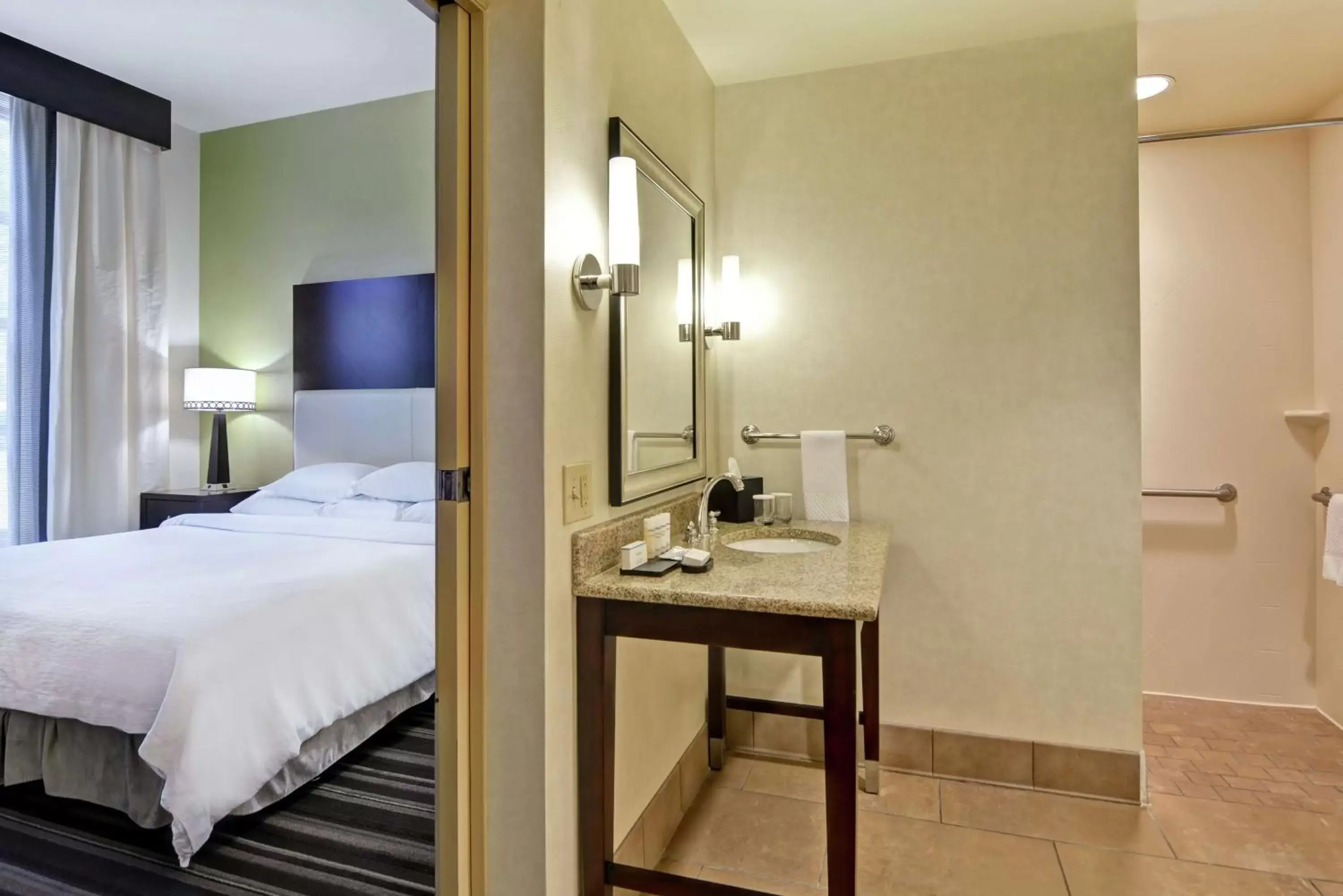Bed, Bathroom in Embassy Suites Savannah Airport