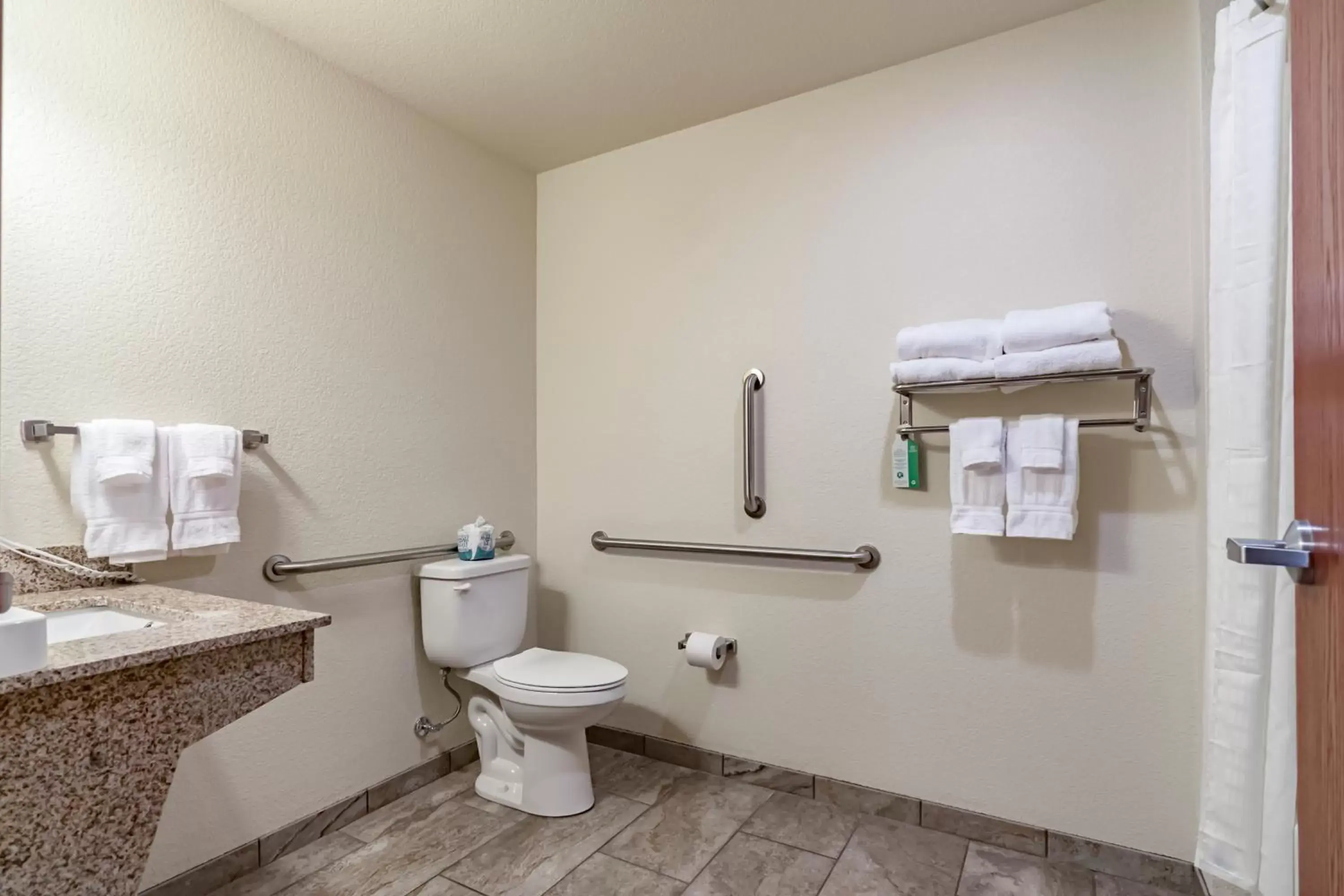 Toilet, Bathroom in Cobblestone Inn & Suites - Lamoni