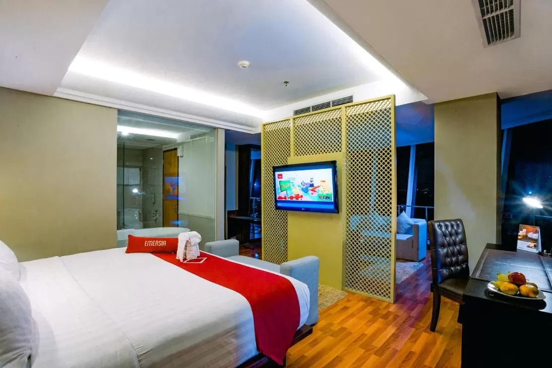 Bed in Emersia Hotel and Resort