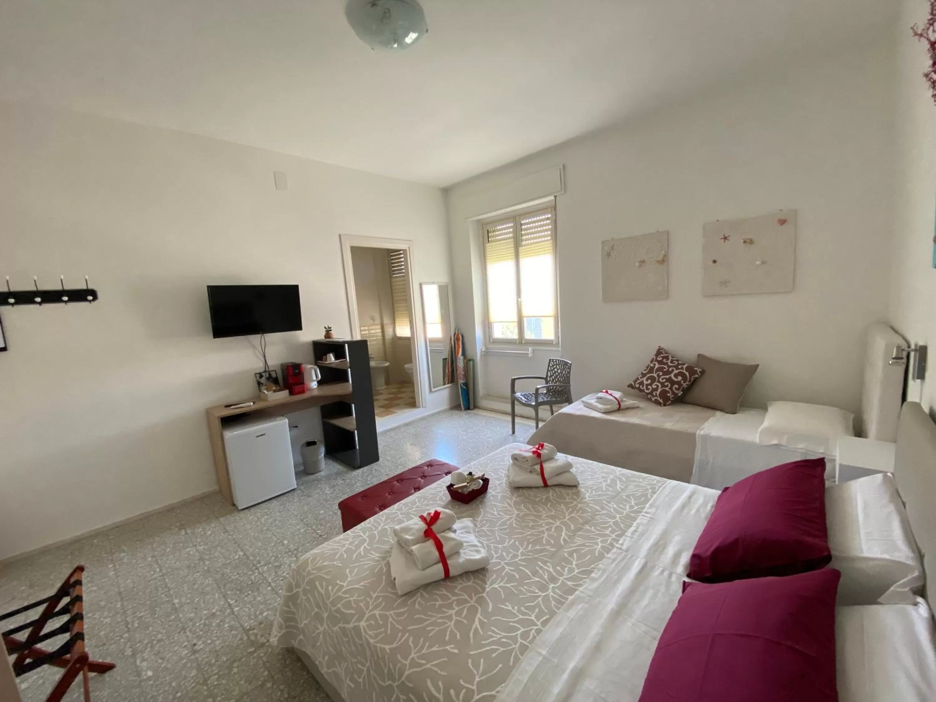 Photo of the whole room, Seating Area in Rossocorallo Rooms