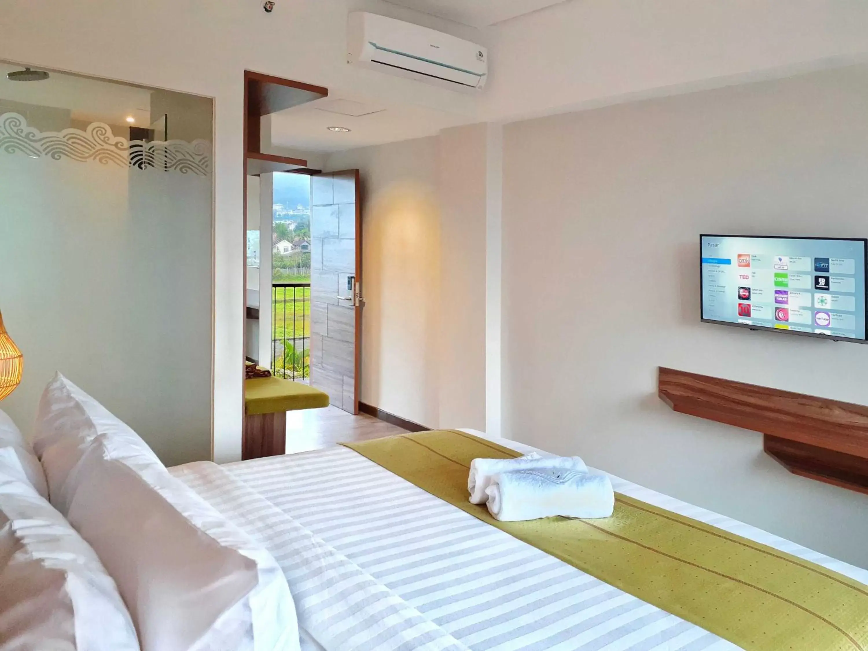 Bed in The Batu Hotel & Villas