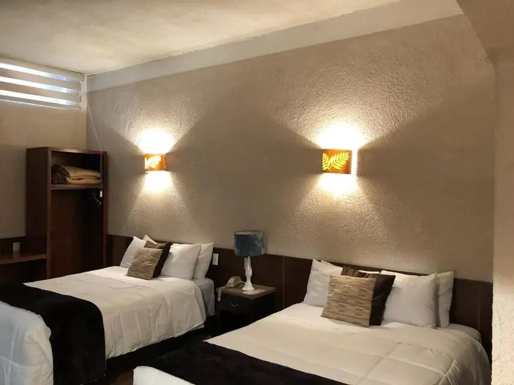 Bed in Hotel Casa Blanca