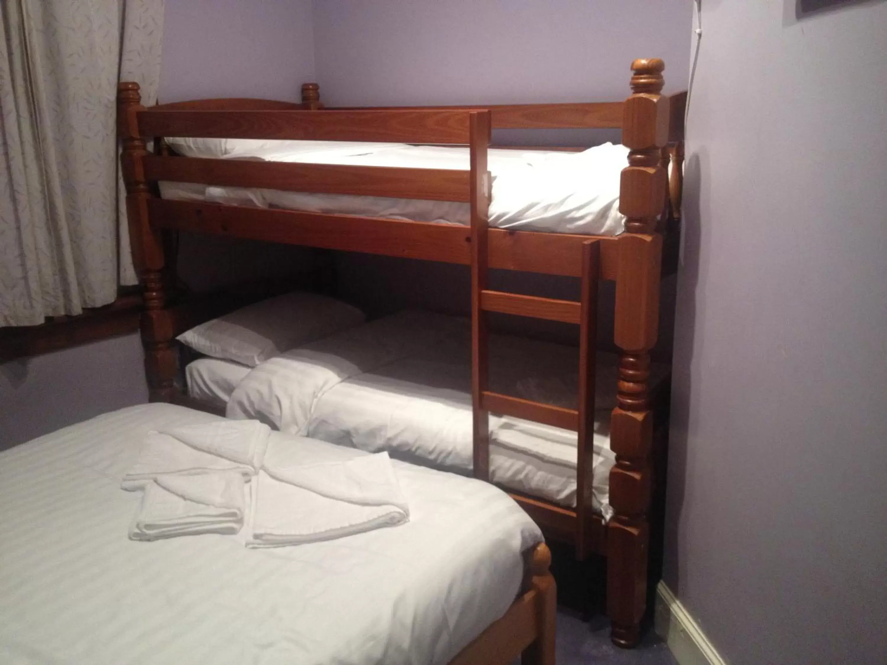 Bed, Bunk Bed in Twin Lions Hotel