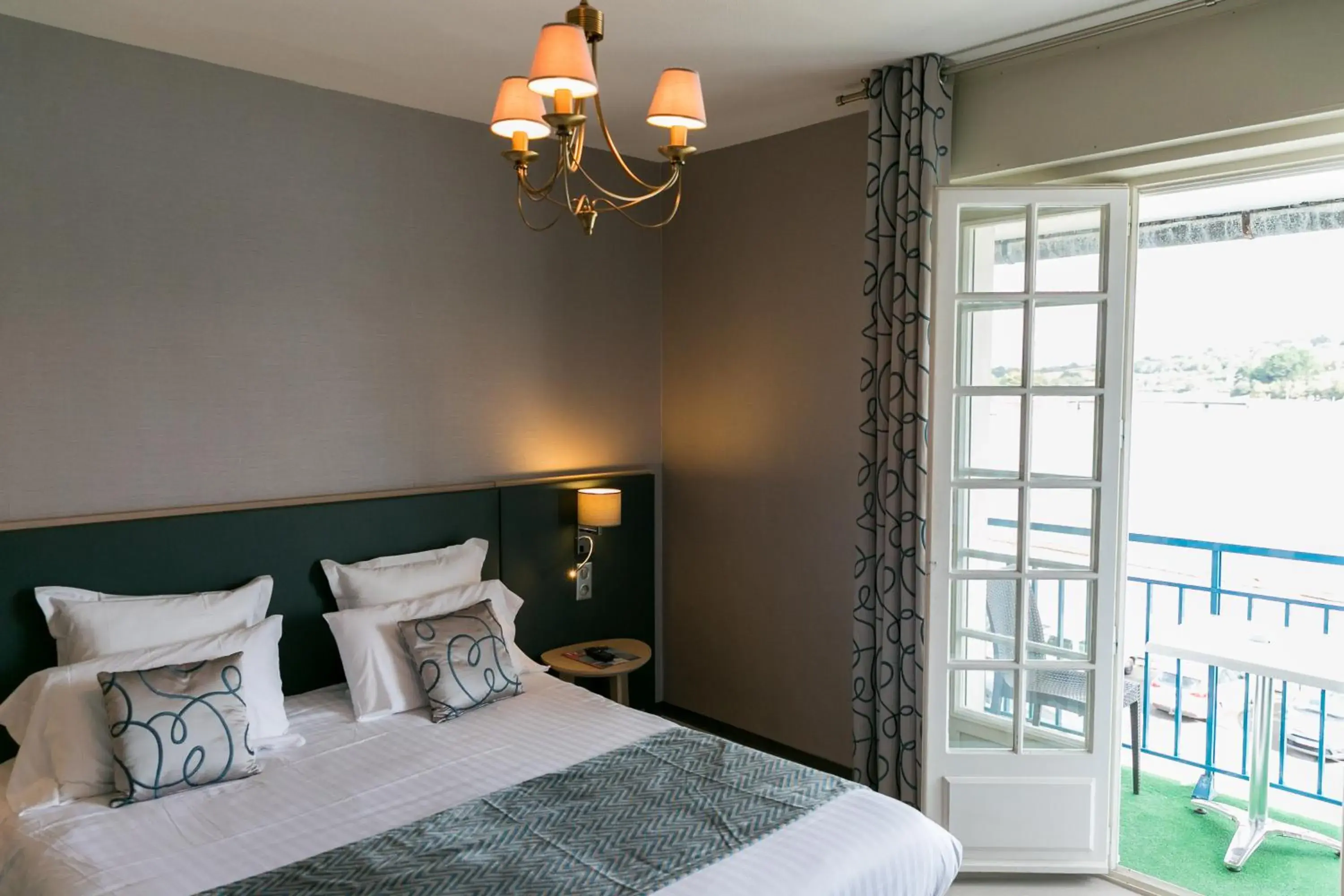 Photo of the whole room, Bed in Hôtel Le Goyen