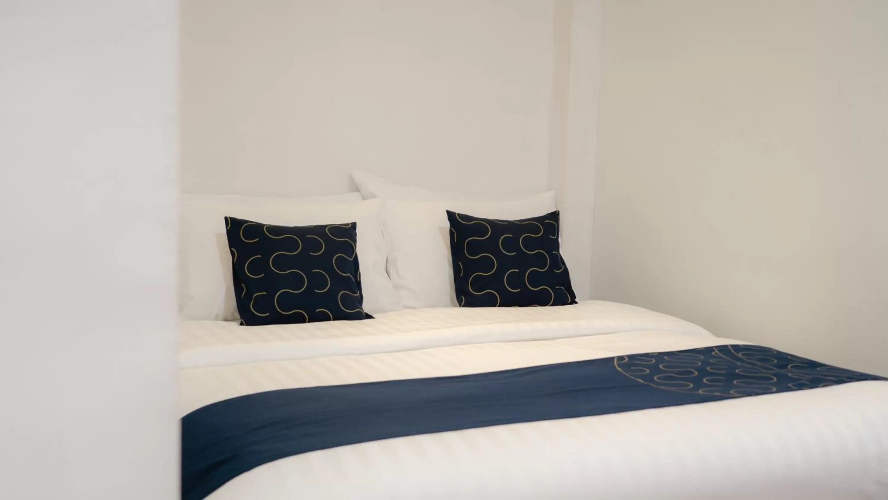 Bed in Cheva Gallery Boutique Hotel