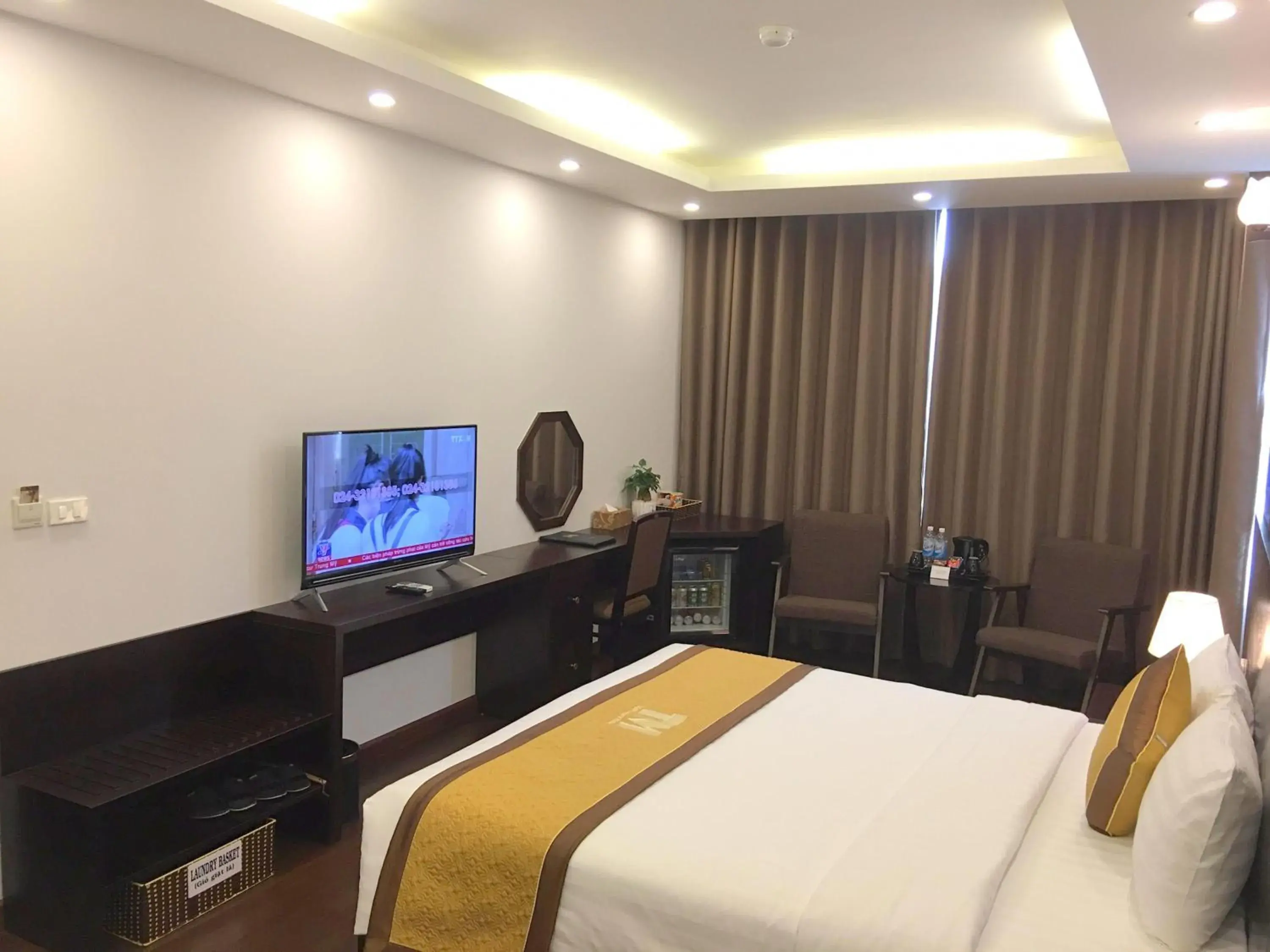 Bedroom, TV/Entertainment Center in T&M Luxury Hotel Hanoi