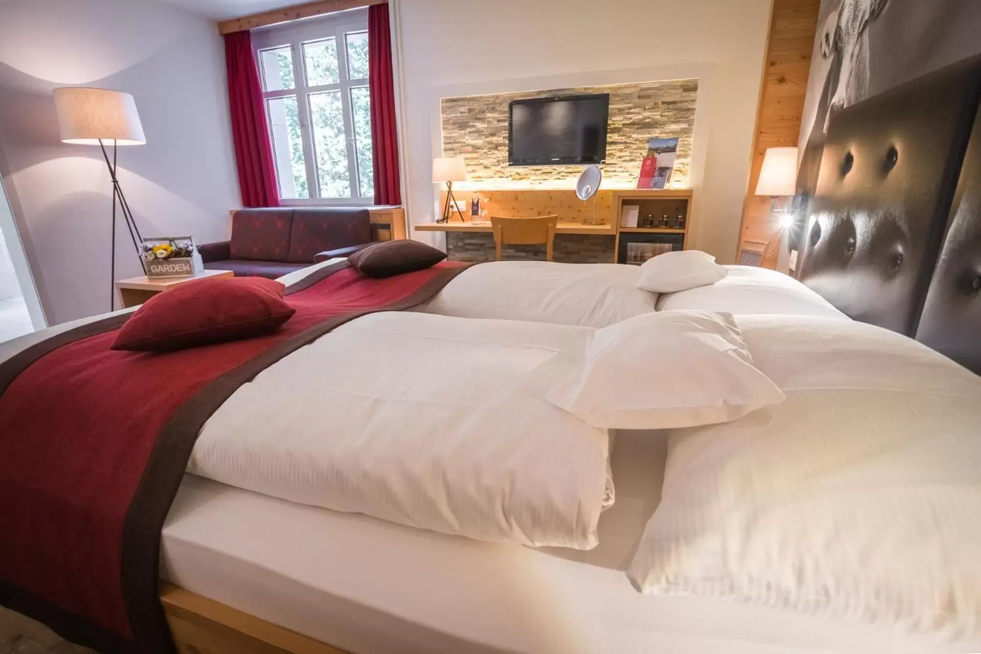 Bed in Blatter's Arosa Hotel & Bella Vista SPA