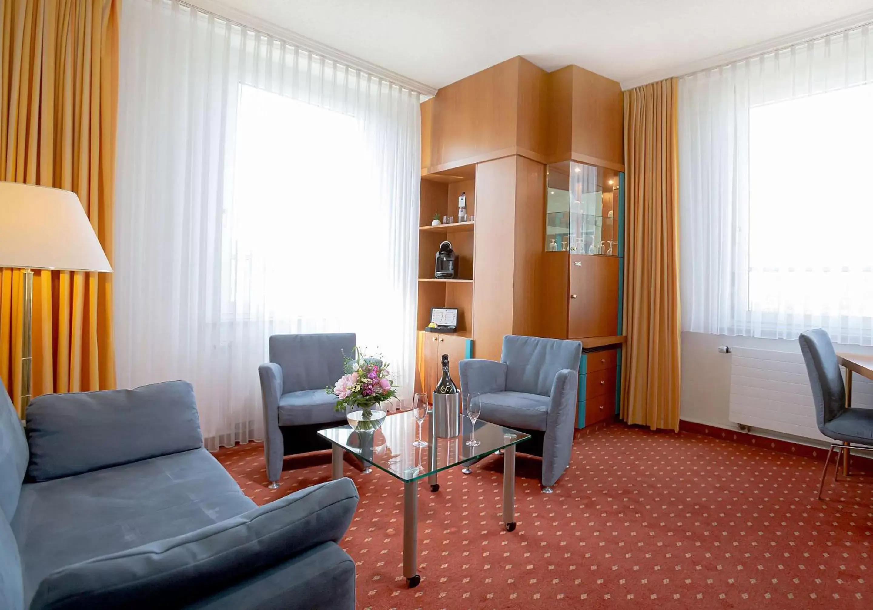 Photo of the whole room, Seating Area in Dorint Hotel Leipzig