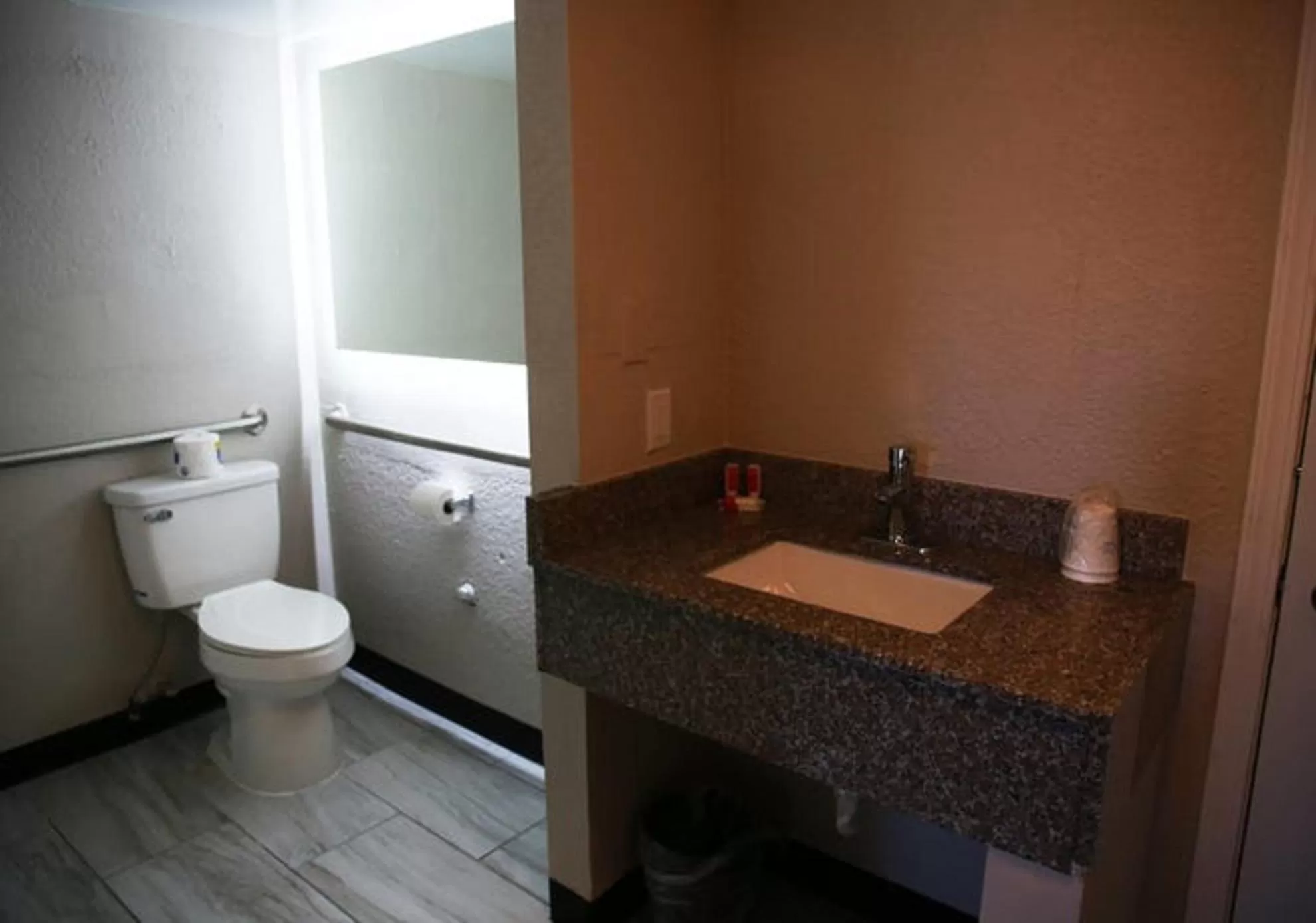 Toilet in Days Inn and Suites by Wyndham Port Huron