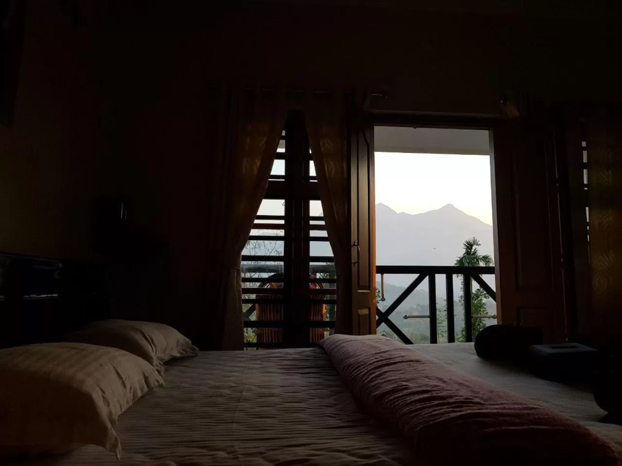 Bed in Woodrose Resort