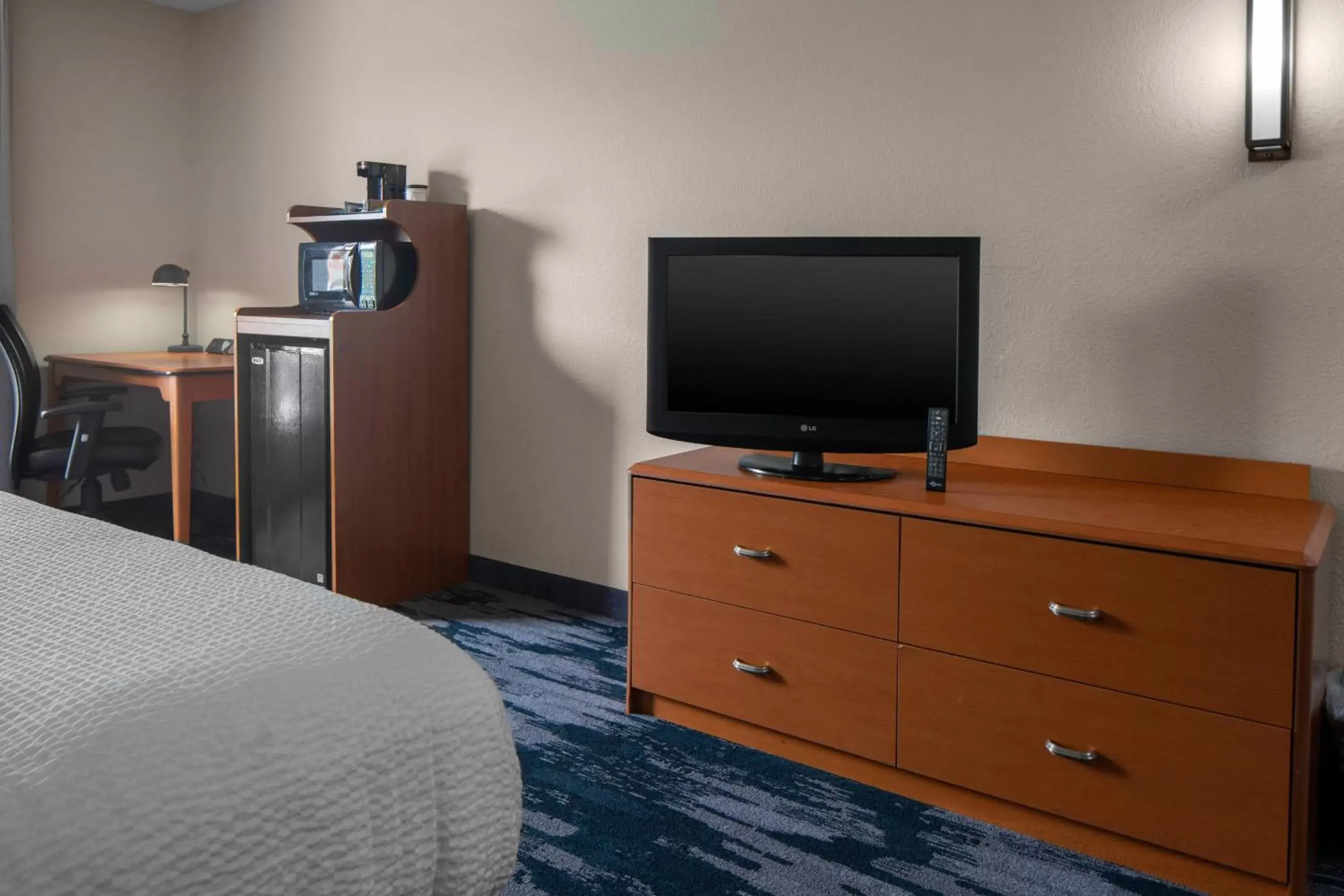 Photo of the whole room, TV/Entertainment Center in Fairfield Inn & Suites Jefferson City