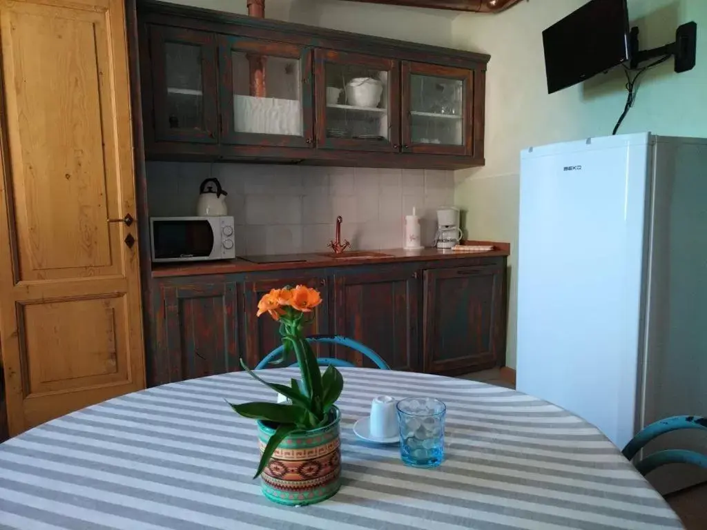 Kitchen/Kitchenette in Borgo al Sole by Garda Facilities