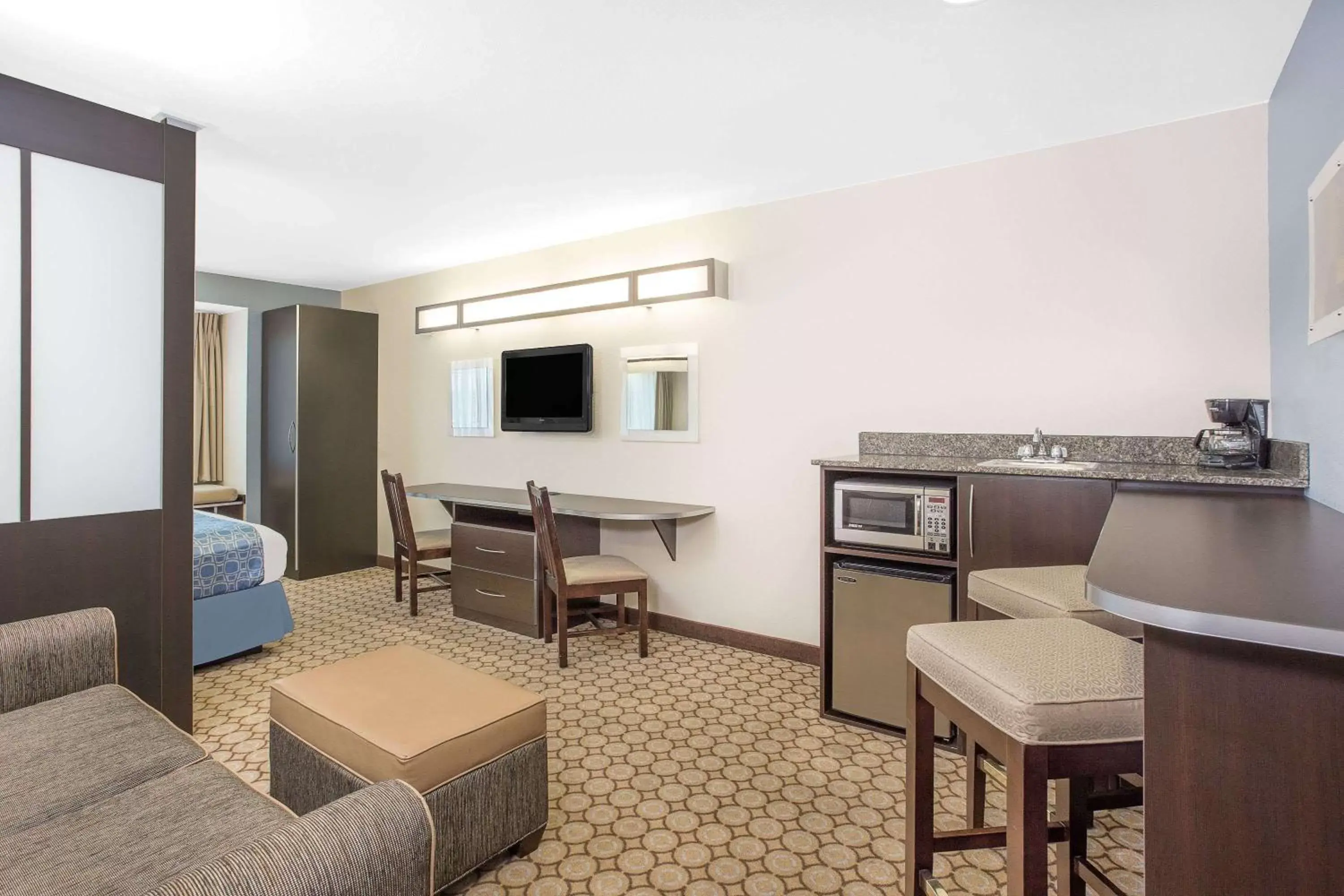 Photo of the whole room, TV/Entertainment Center in Microtel Inn and Suites San Angelo