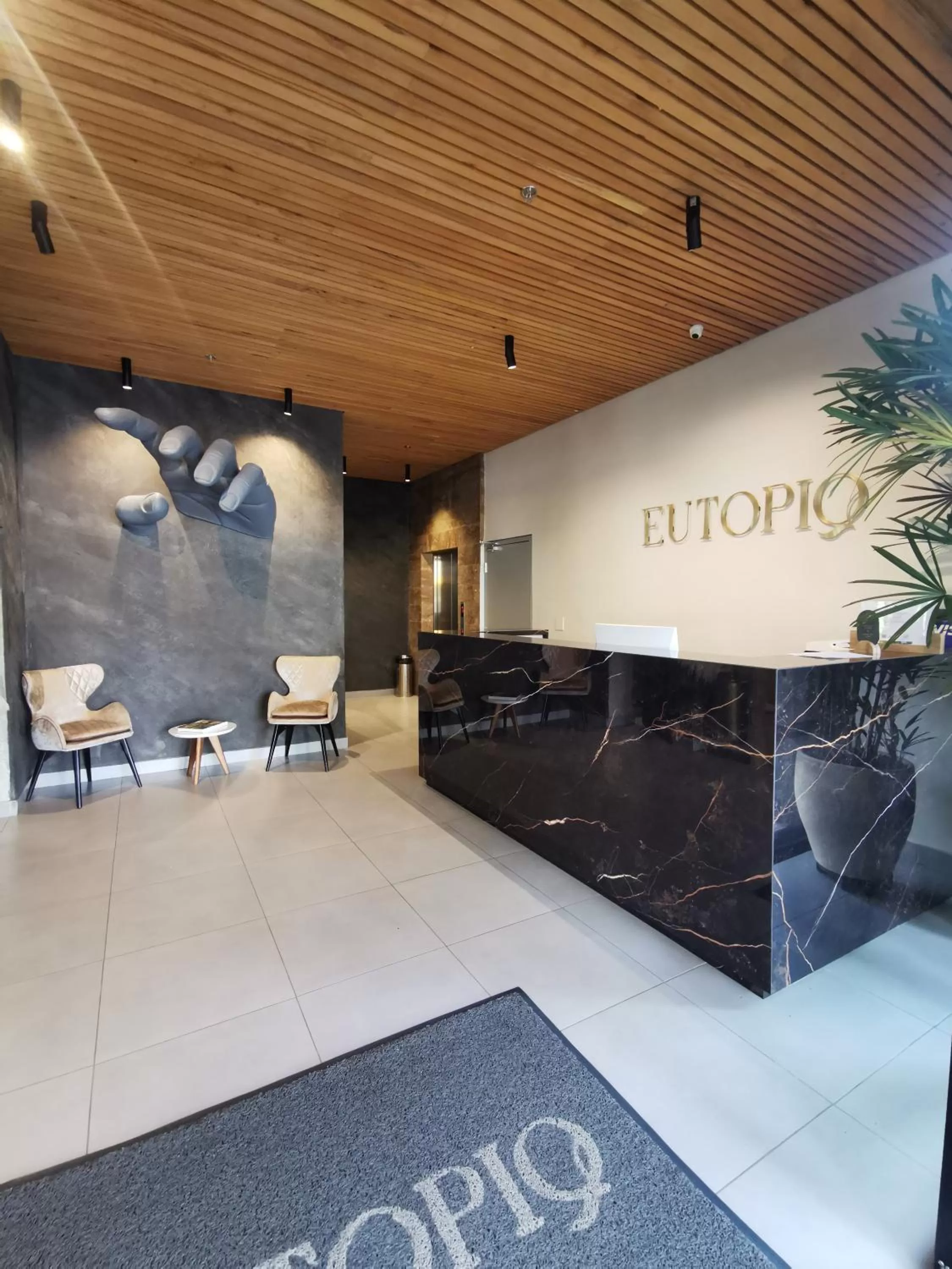 Lobby or reception in Eutopiq Hotel