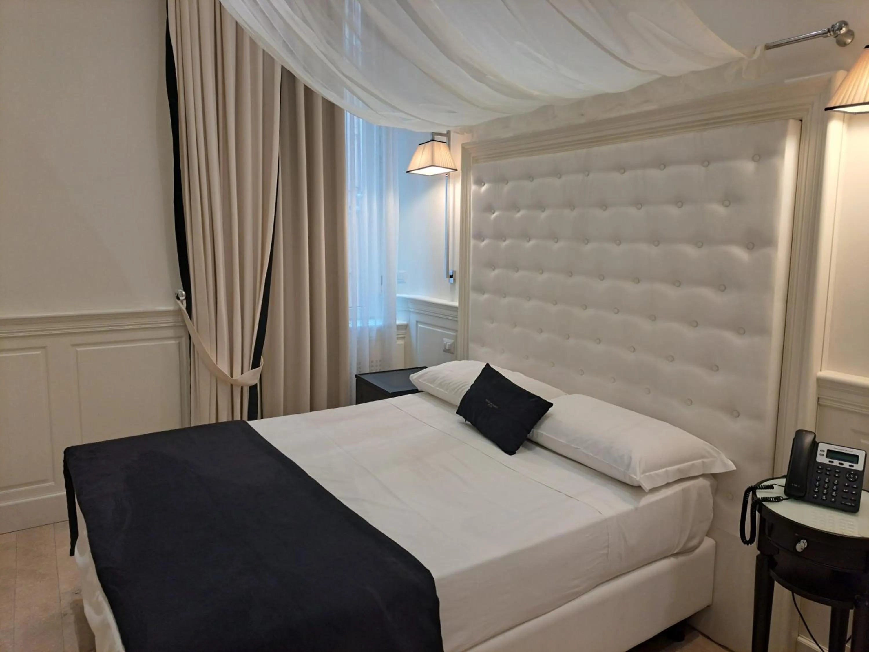 Bed in Hotel dei Quiriti Suite