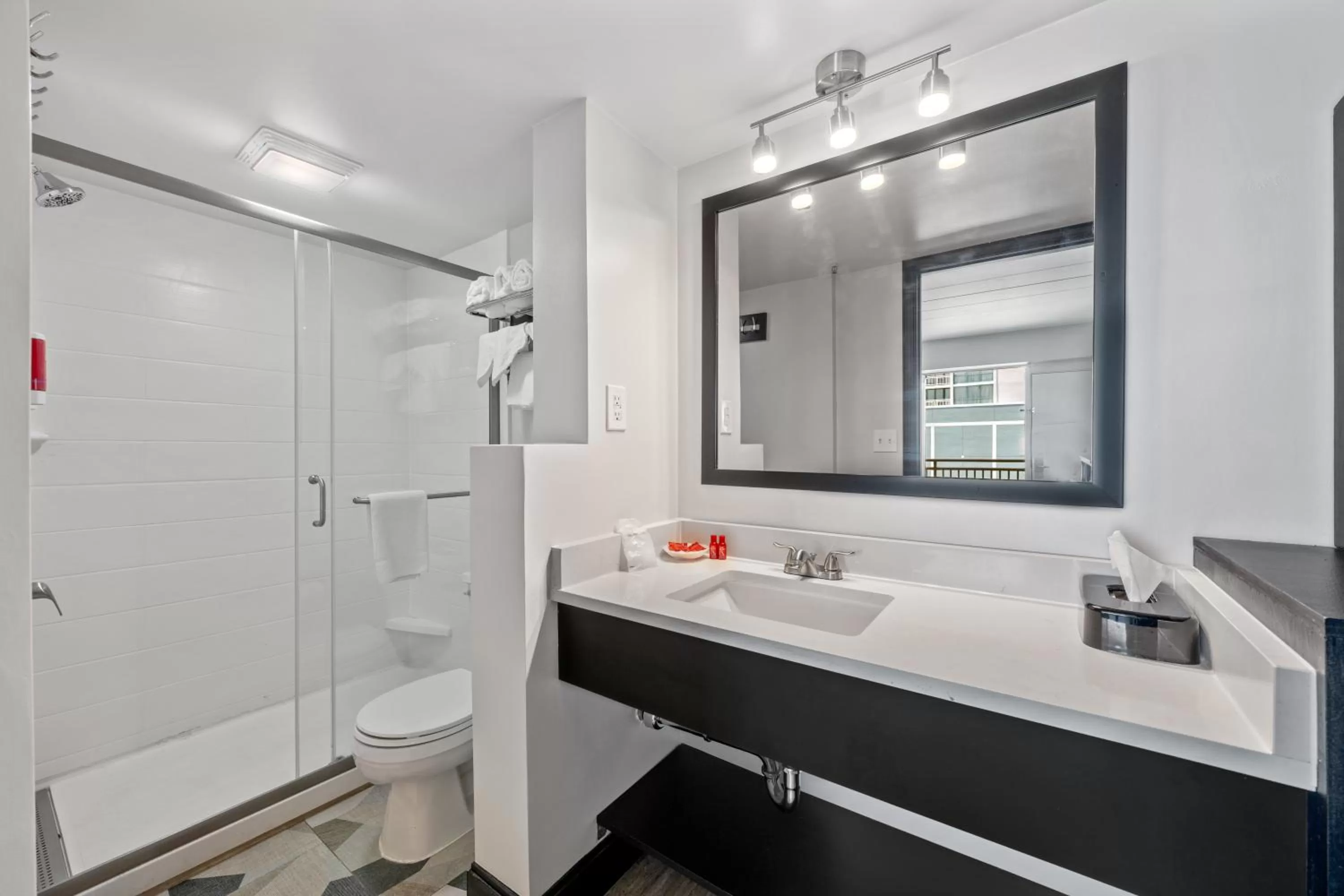 Bathroom in SureStay Hotel by Best Western Virginia Beach Royal Clipper