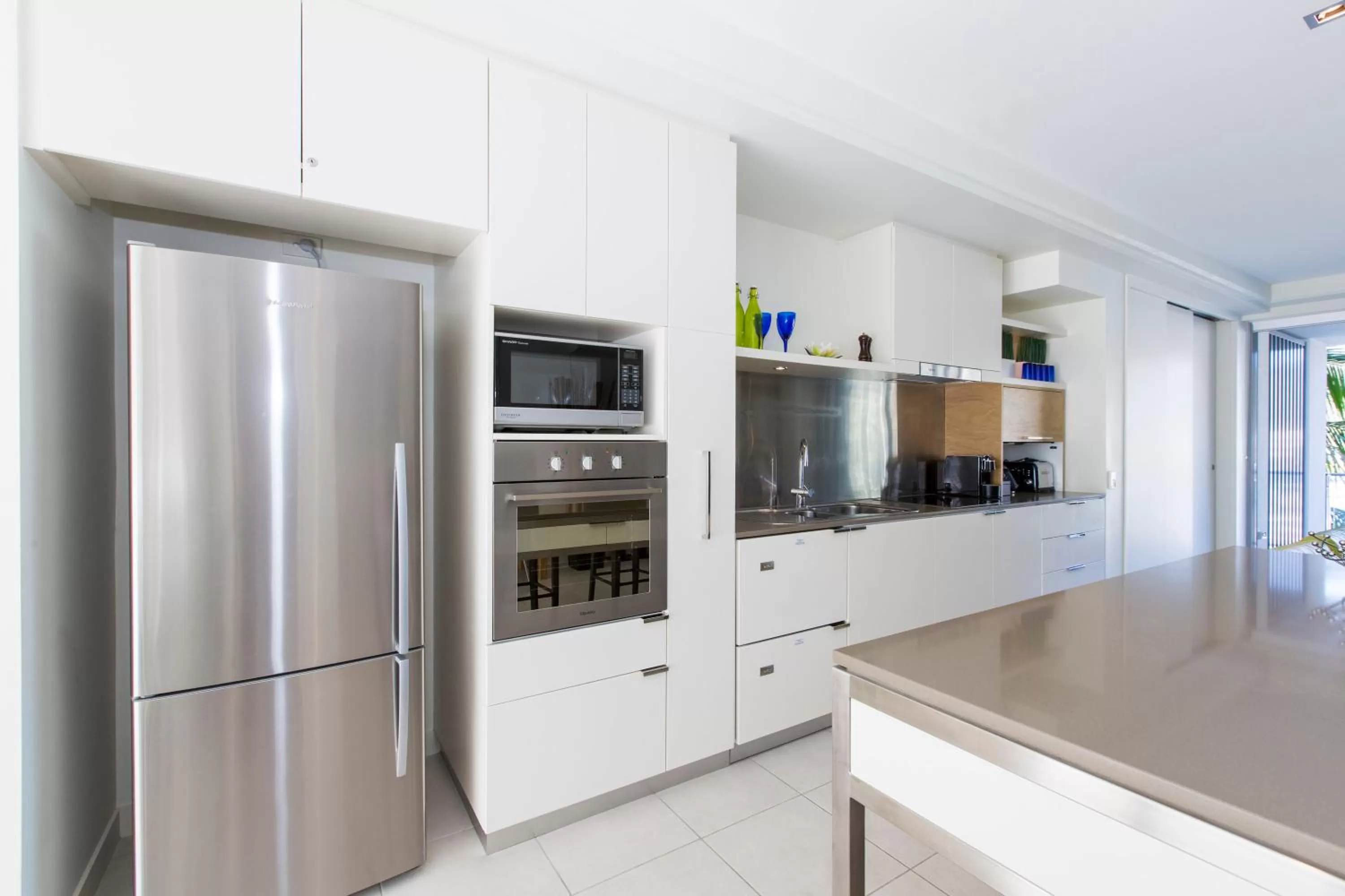 Kitchen or kitchenette in Peppers Blue on Blue