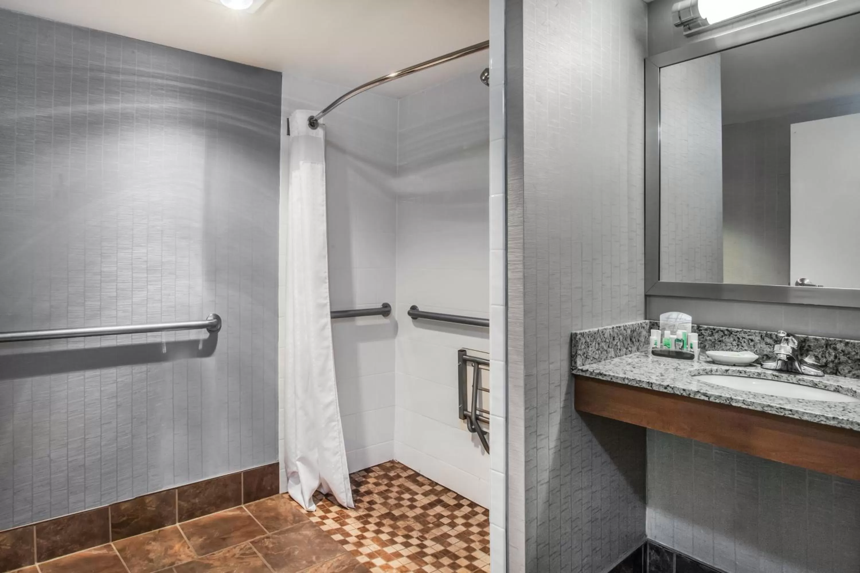 Shower in Holiday Inn Saratoga Springs by IHG