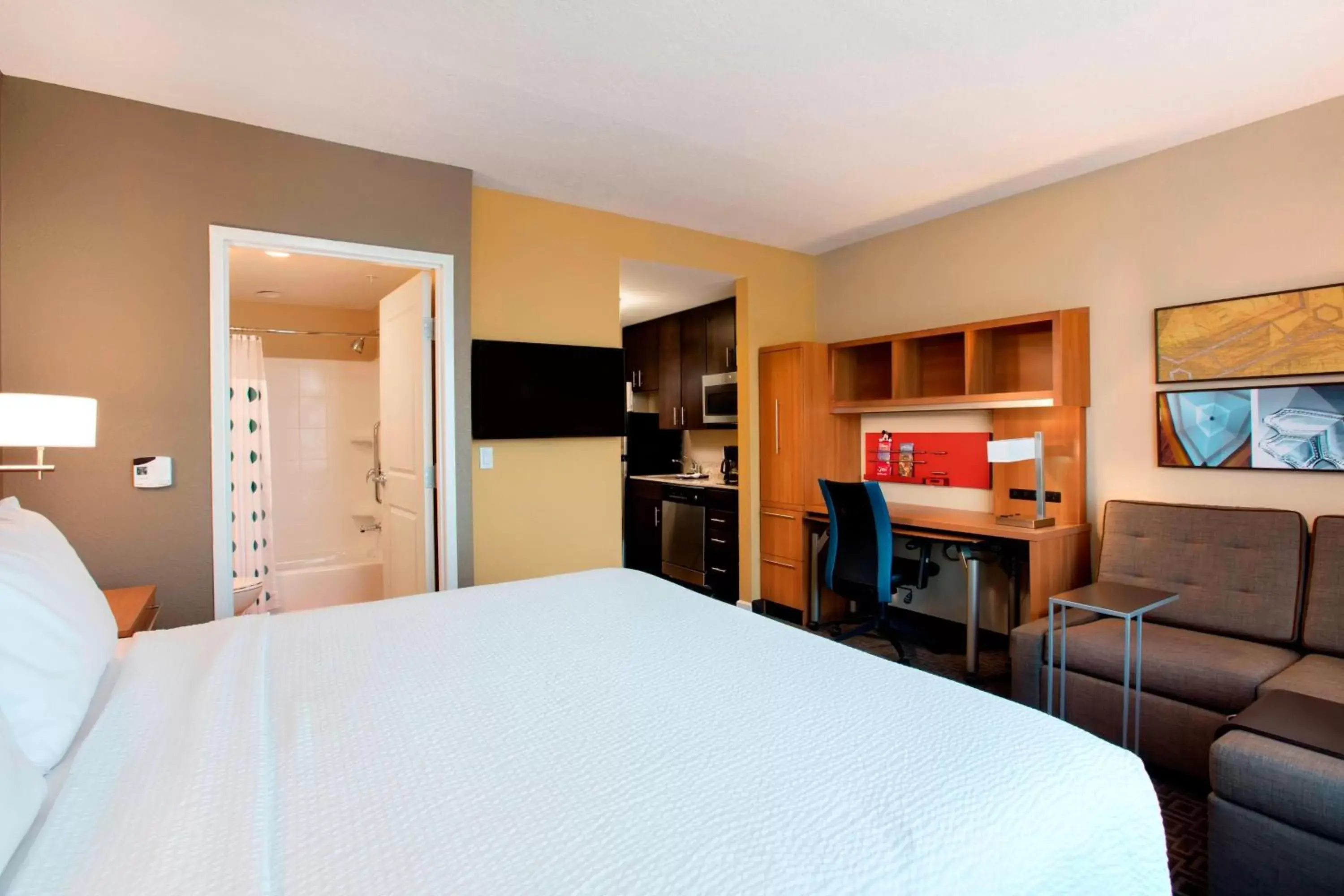Photo of the whole room, Bed in TownePlace Suites Orlando at FLAMINGO CROSSINGS® Town Center/Western Entrance