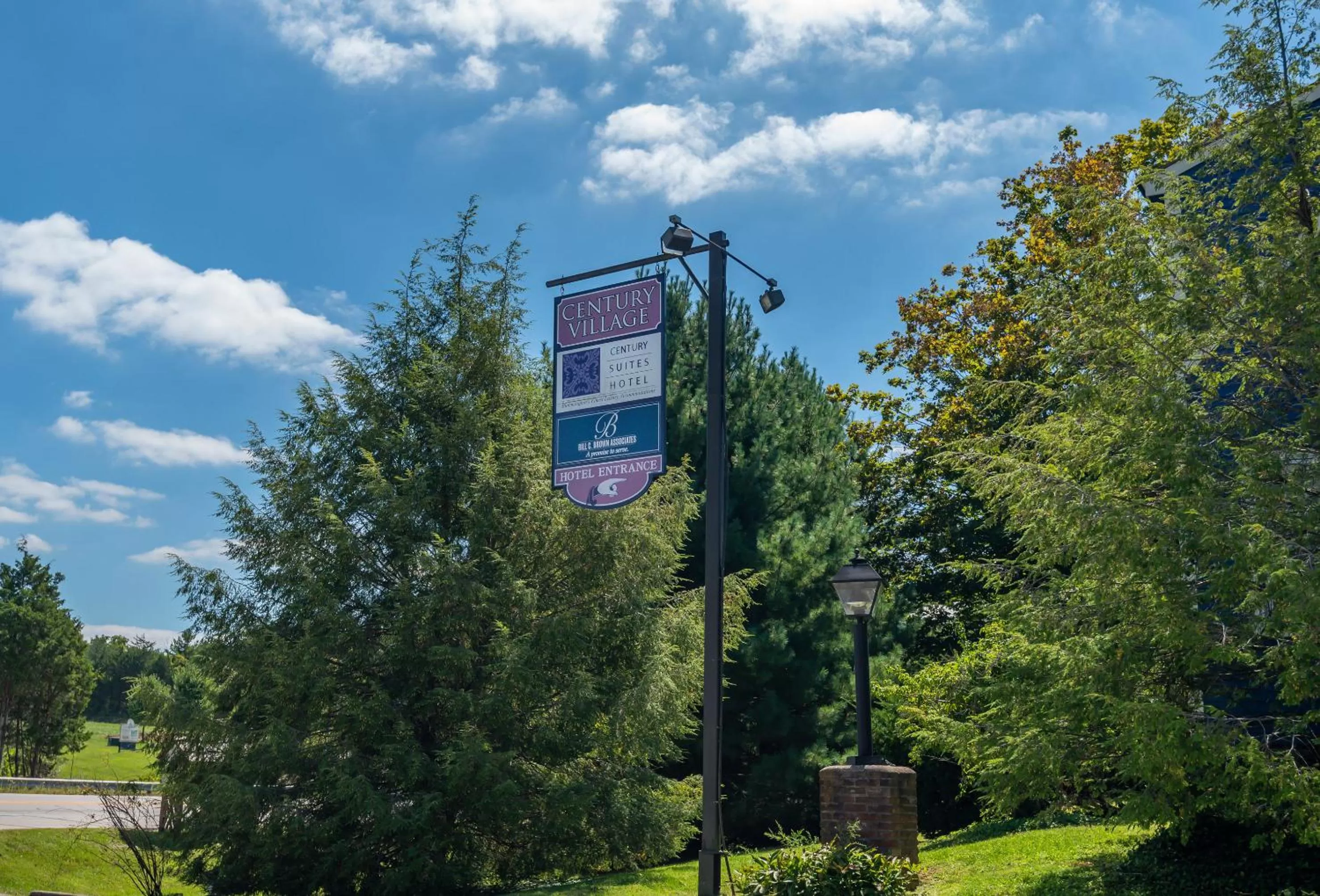 Property logo or sign in Century Suites Hotel