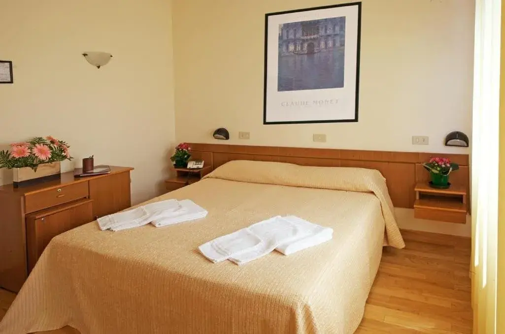 Quadruple Room in Hotel Roma Quadruple Room in Hotel Roma