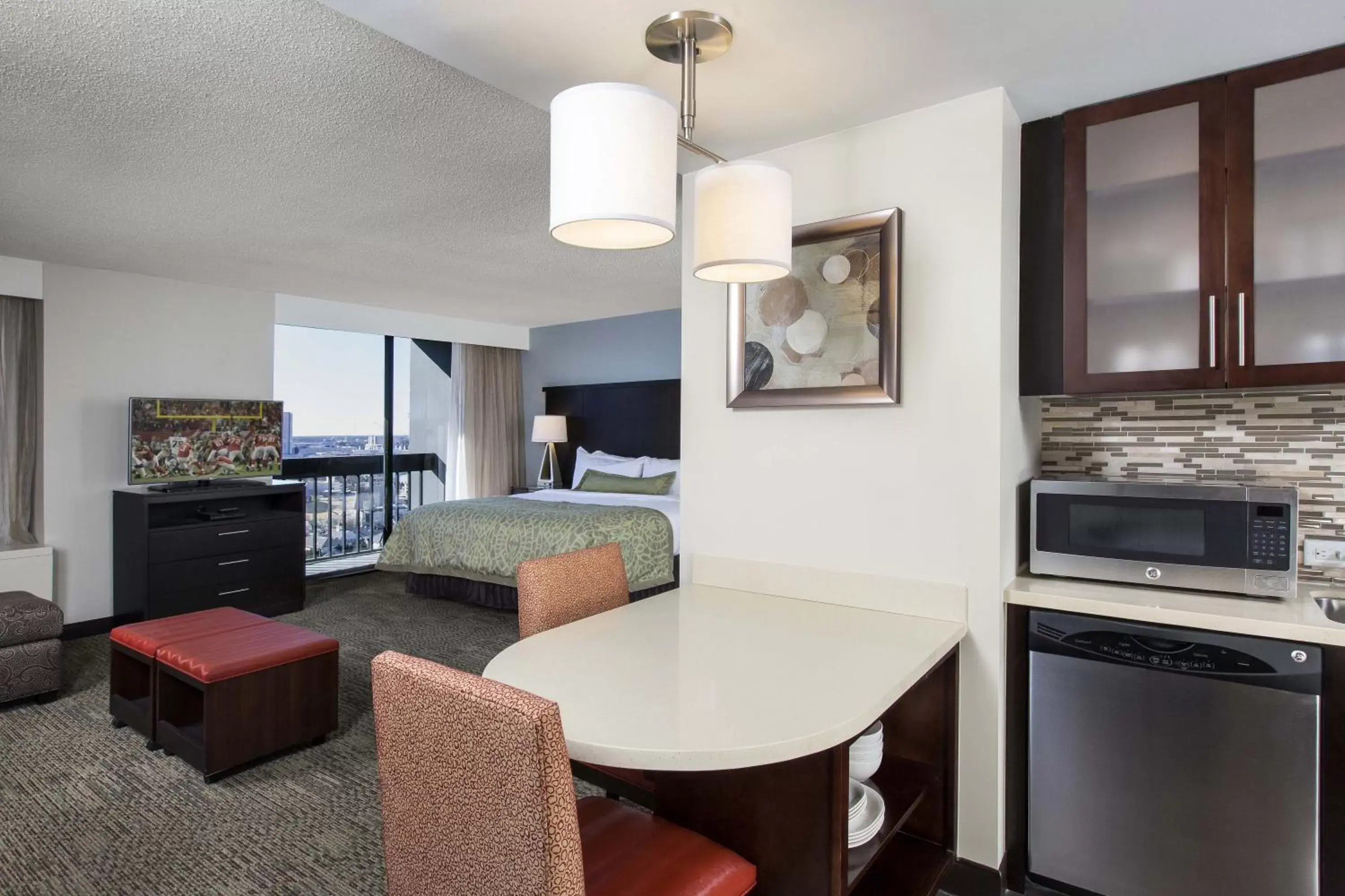 Photo of the whole room, Seating Area in Staybridge Suites Atlanta - Midtown, an IHG Hotel