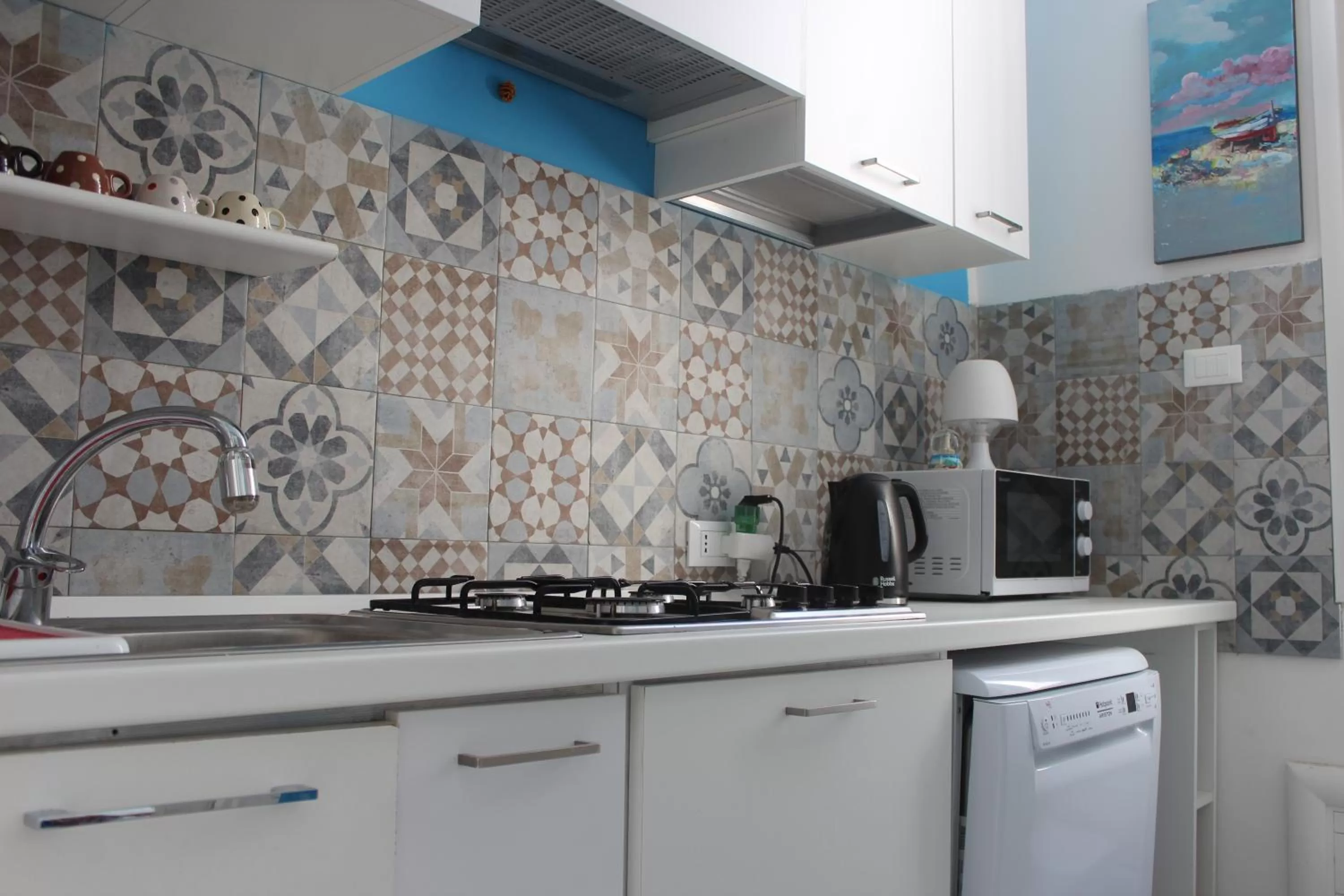 Communal kitchen in La Maison del Sole