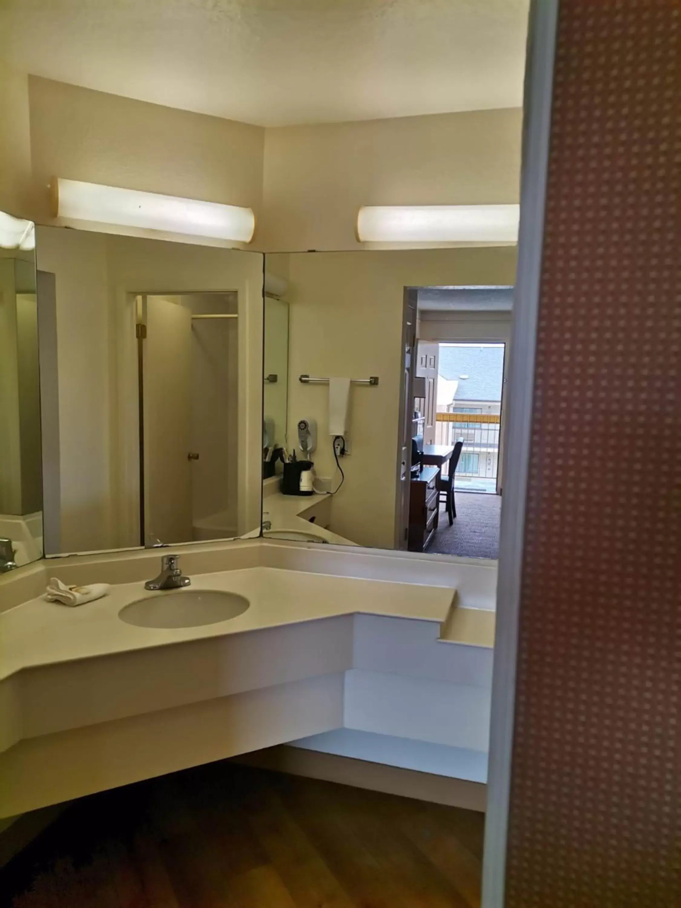 Bathroom in Super 8 by Wyndham San Antonio Near SeaWorld Ingram Park
