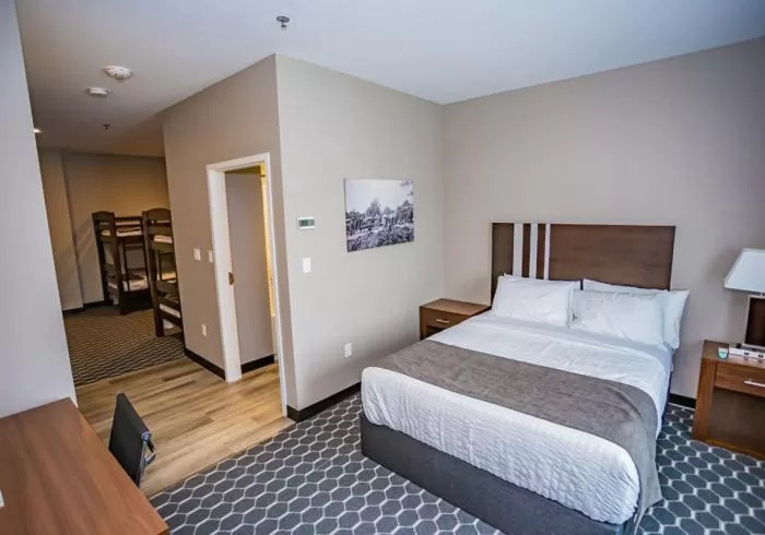 Bed in Carman Blue Crescent Hotel