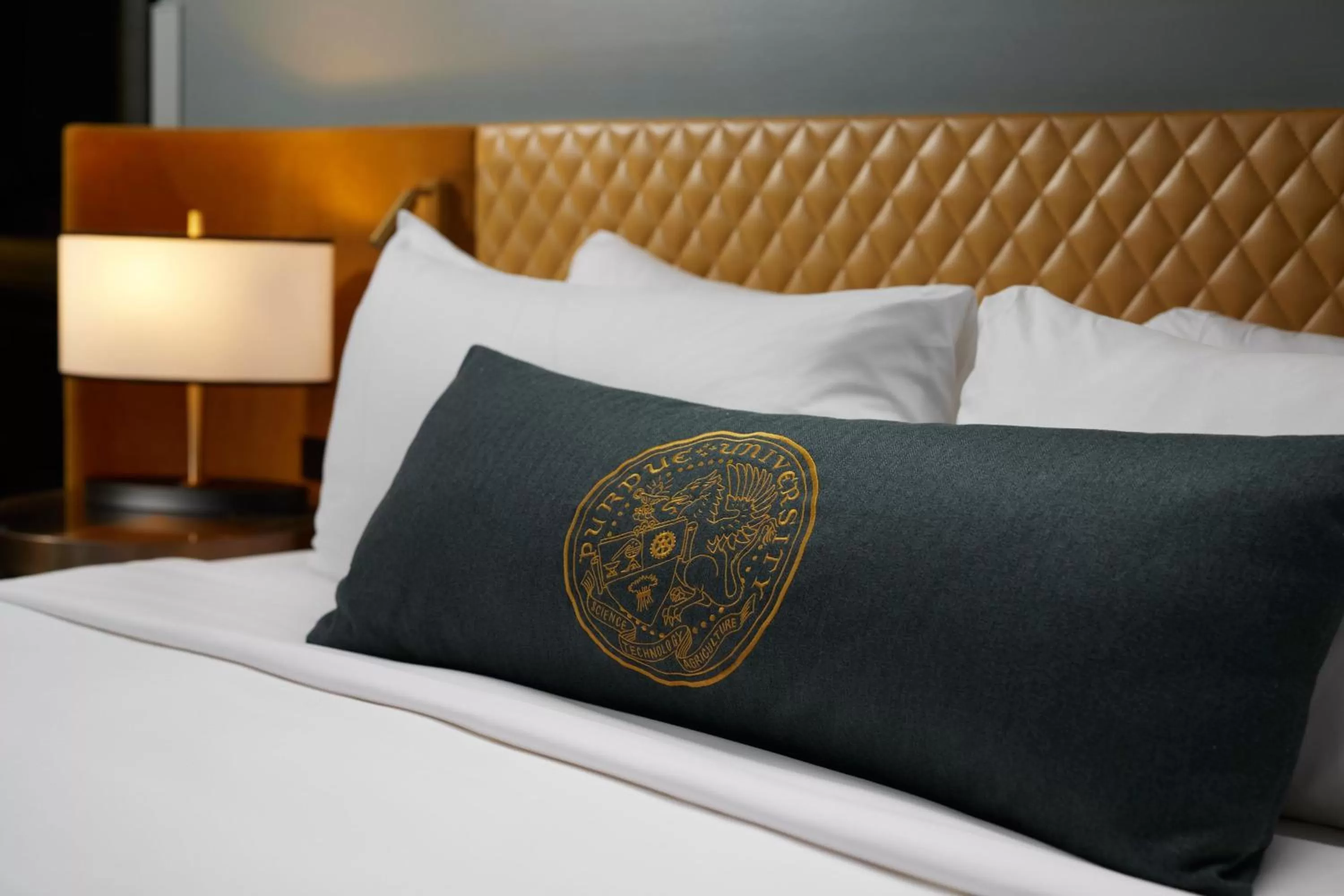 Photo of the whole room, Bed in The Union Club Hotel at Purdue University, Autograph Collection