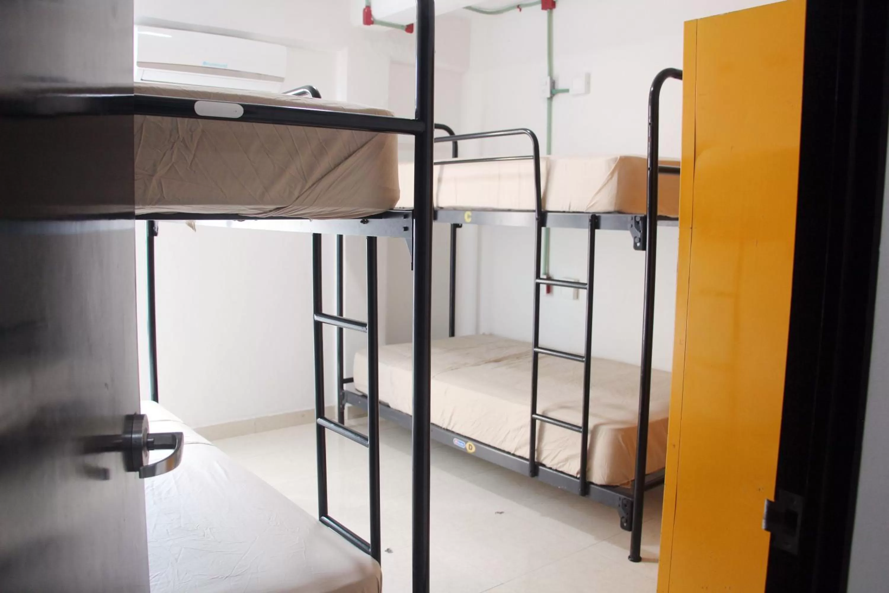 Photo of the whole room, Bunk Bed in Hotel & Hostal Casa de Luz Cancun