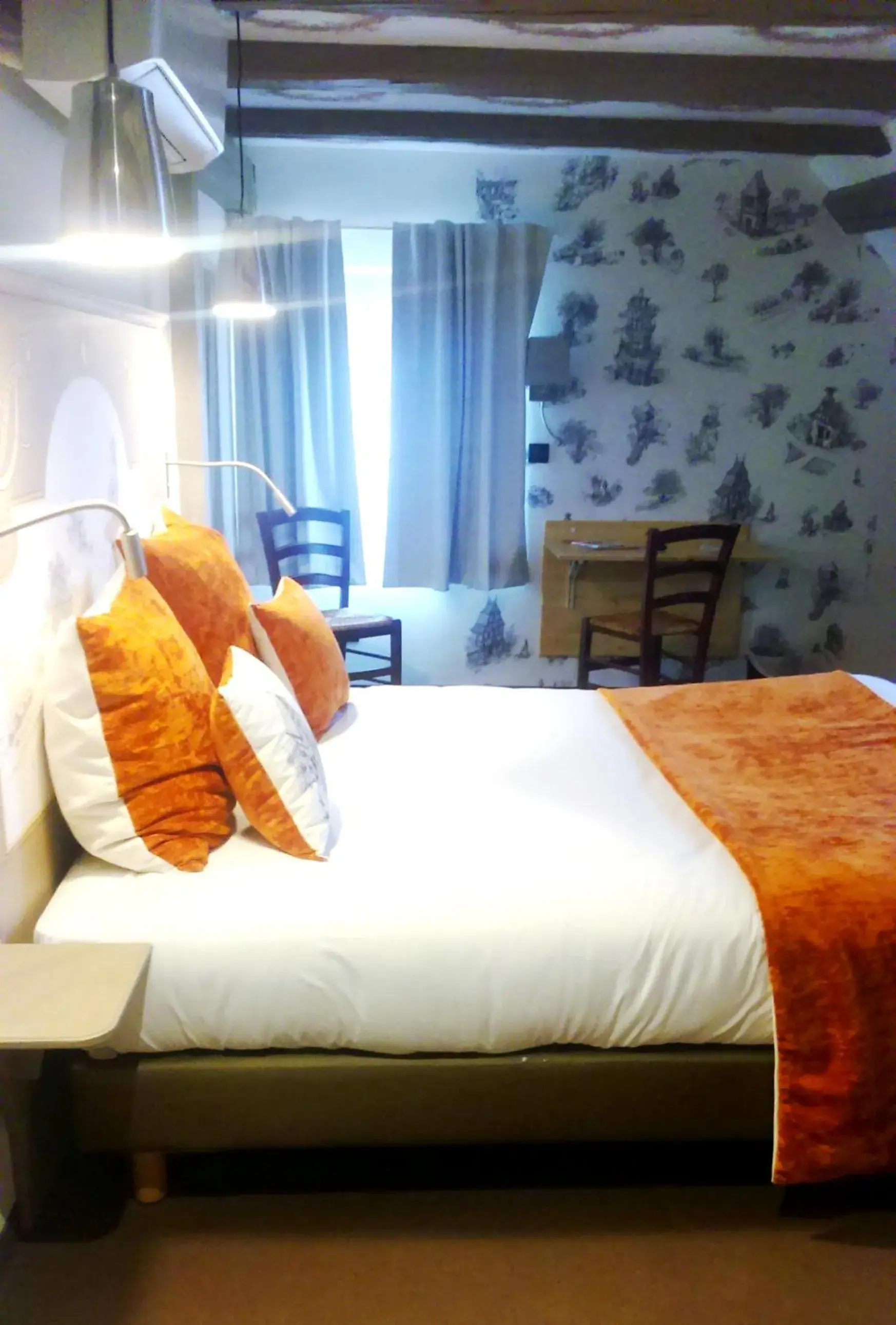 Photo of the whole room, Bed in Brit Hotel Confort La Ferme du Pape