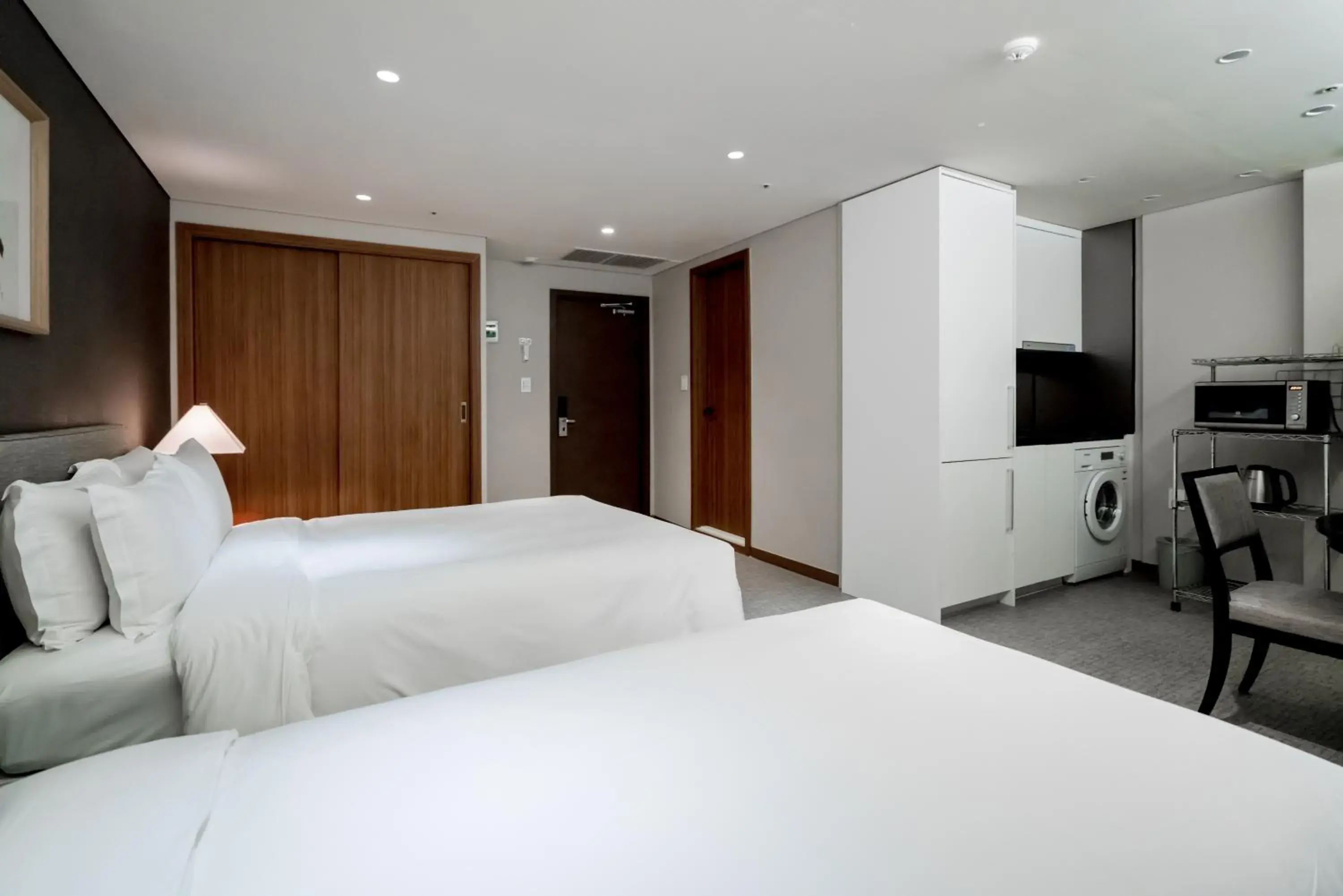 Bed in Oriens Hotel & Residences Myeongdong