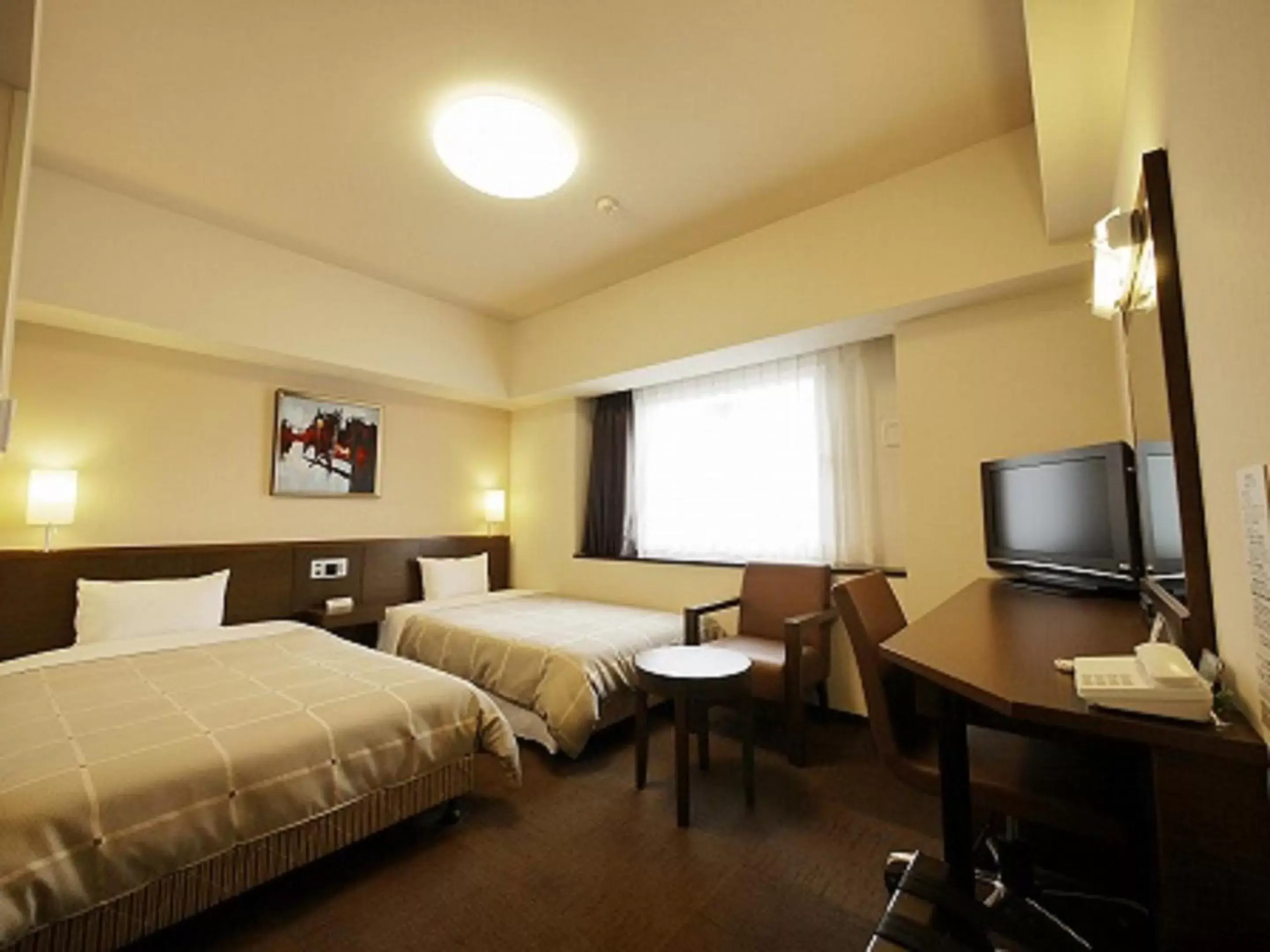 Bed, TV/Entertainment Center in Hotel Route-Inn Hikone