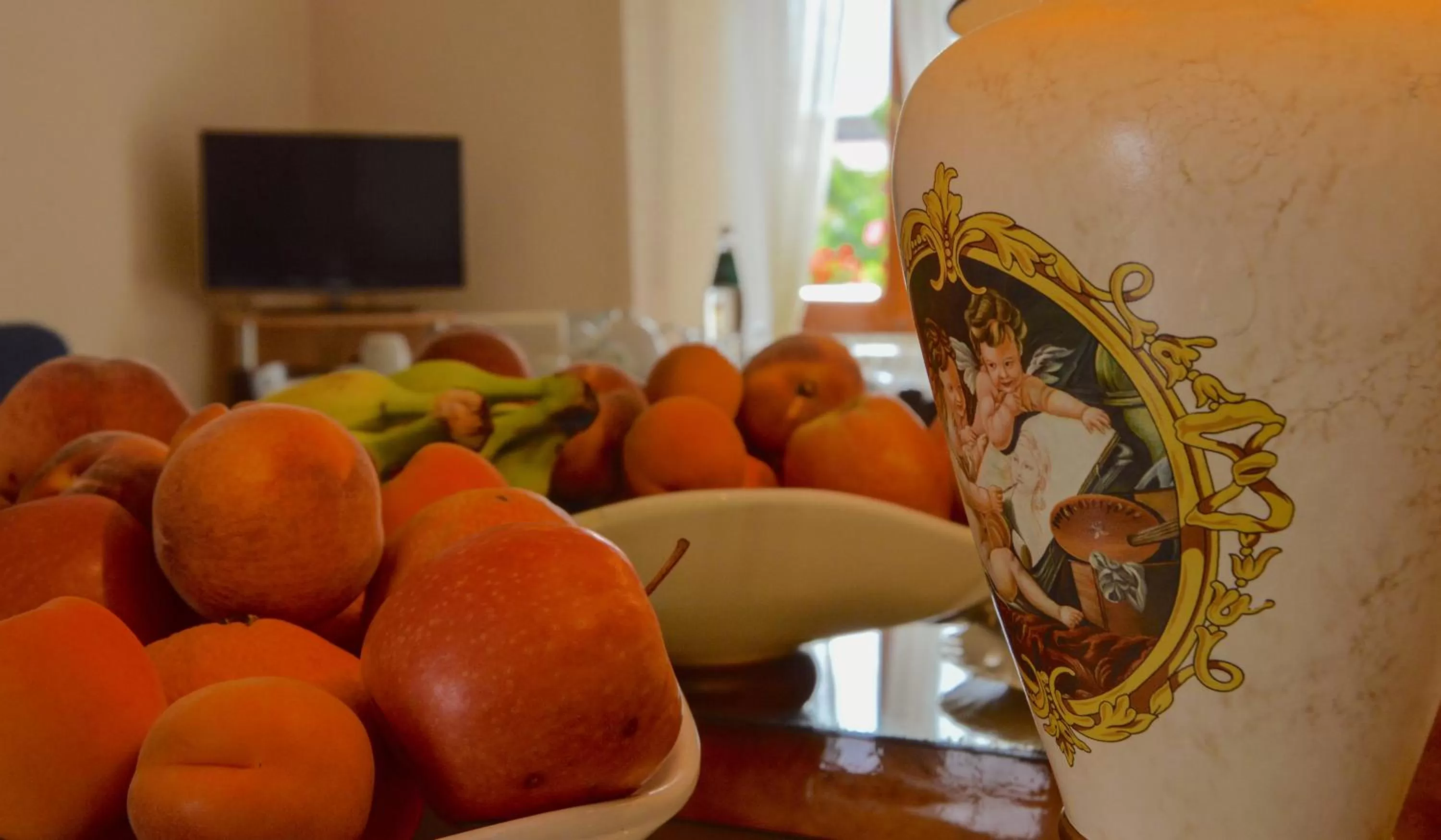 Communal lounge/ TV room in B&B La Genziana