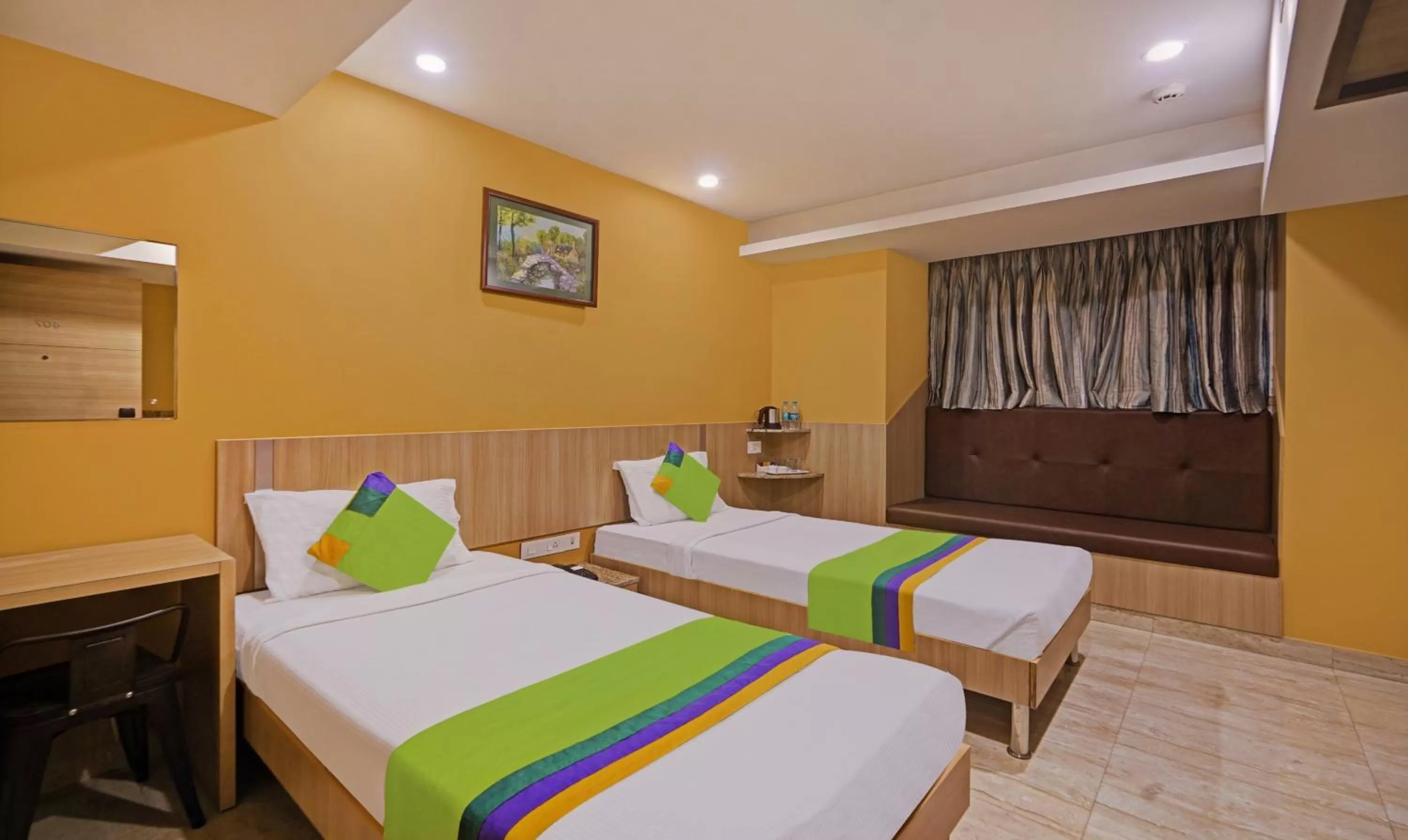 Bedroom, Bed in Treebo Fourth Avenue