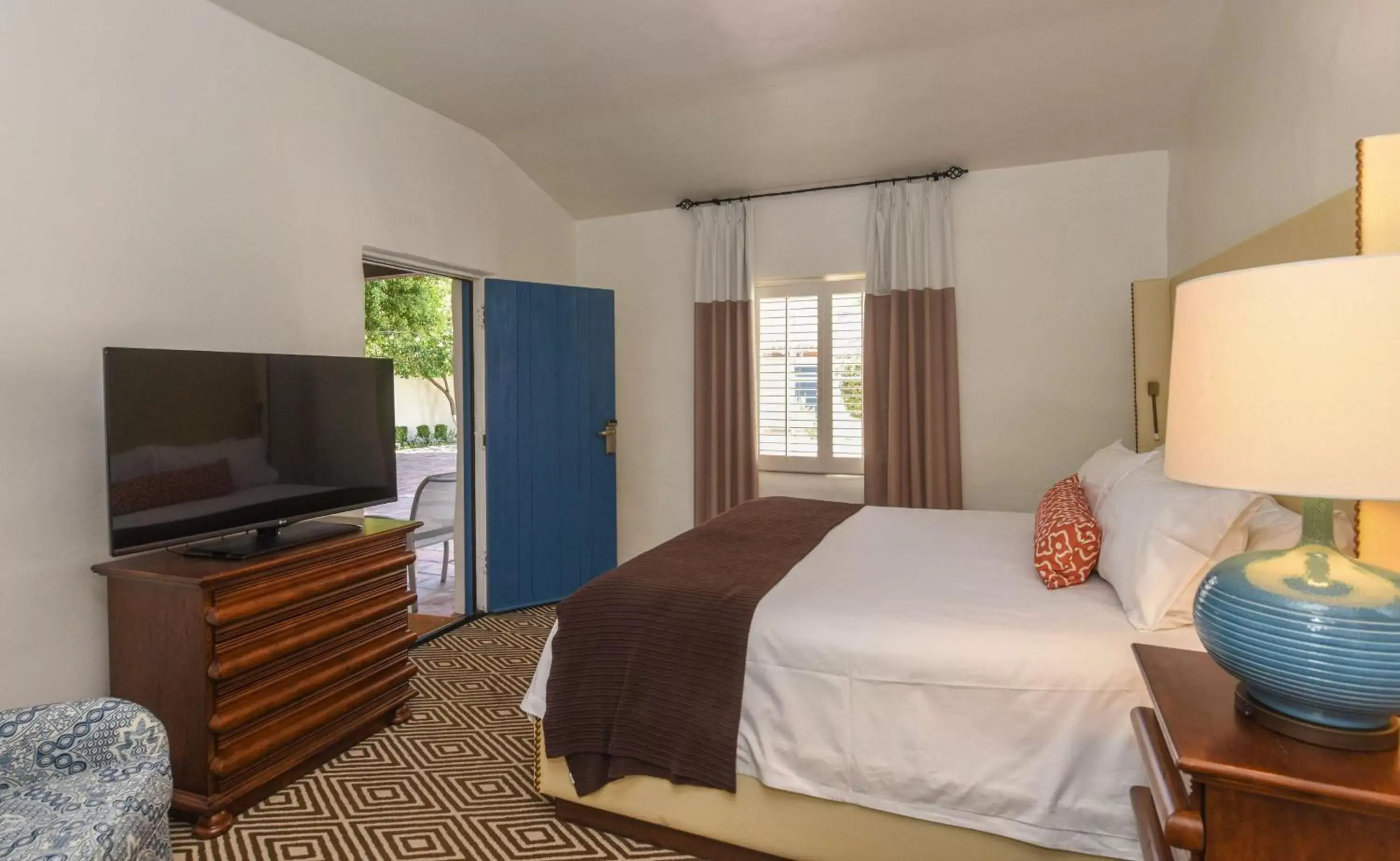 Bedroom, TV/Entertainment Center in La Quinta Resort & Club, Curio Collection