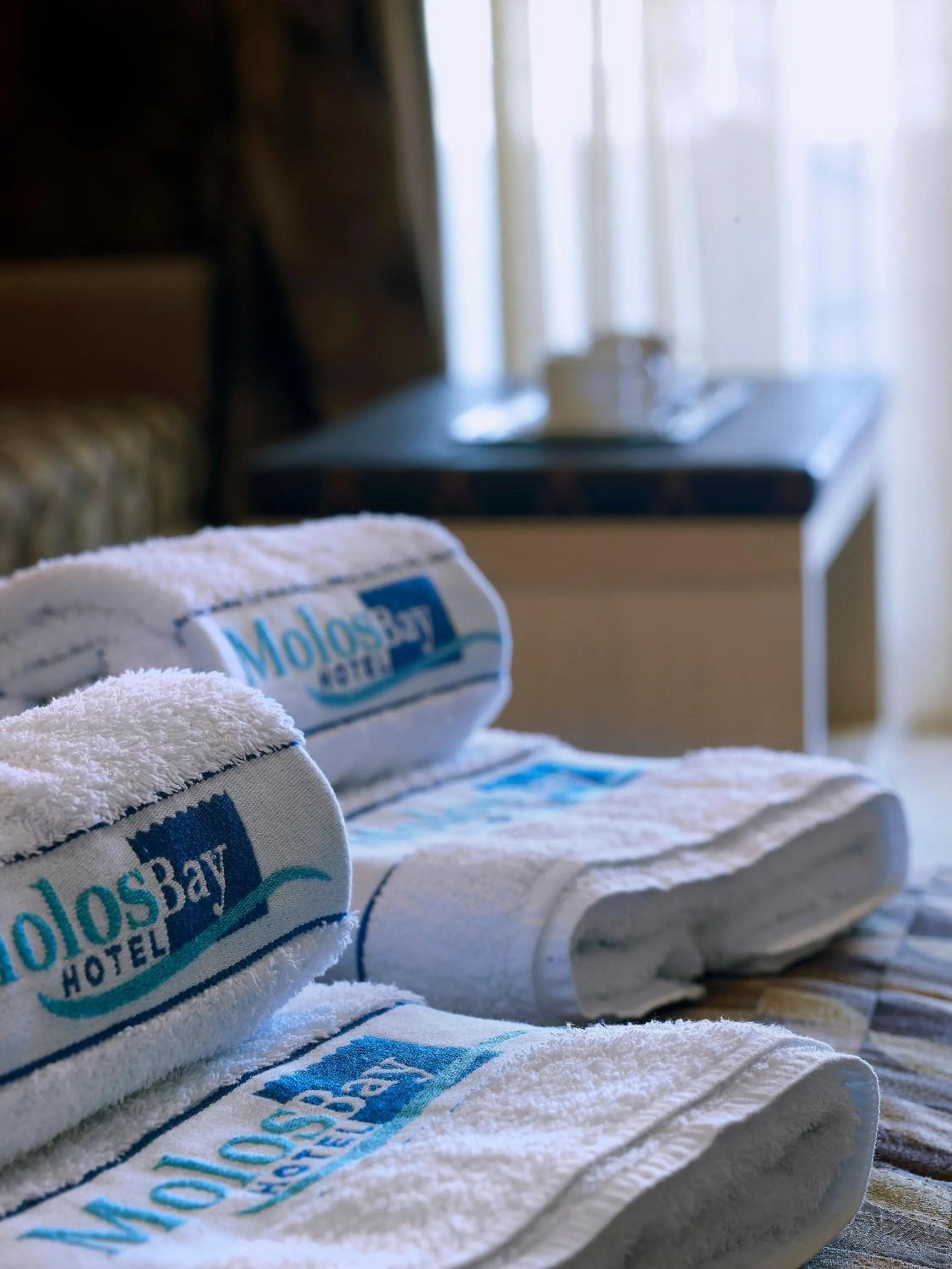 towels, Bed in Molos Bay Hotel