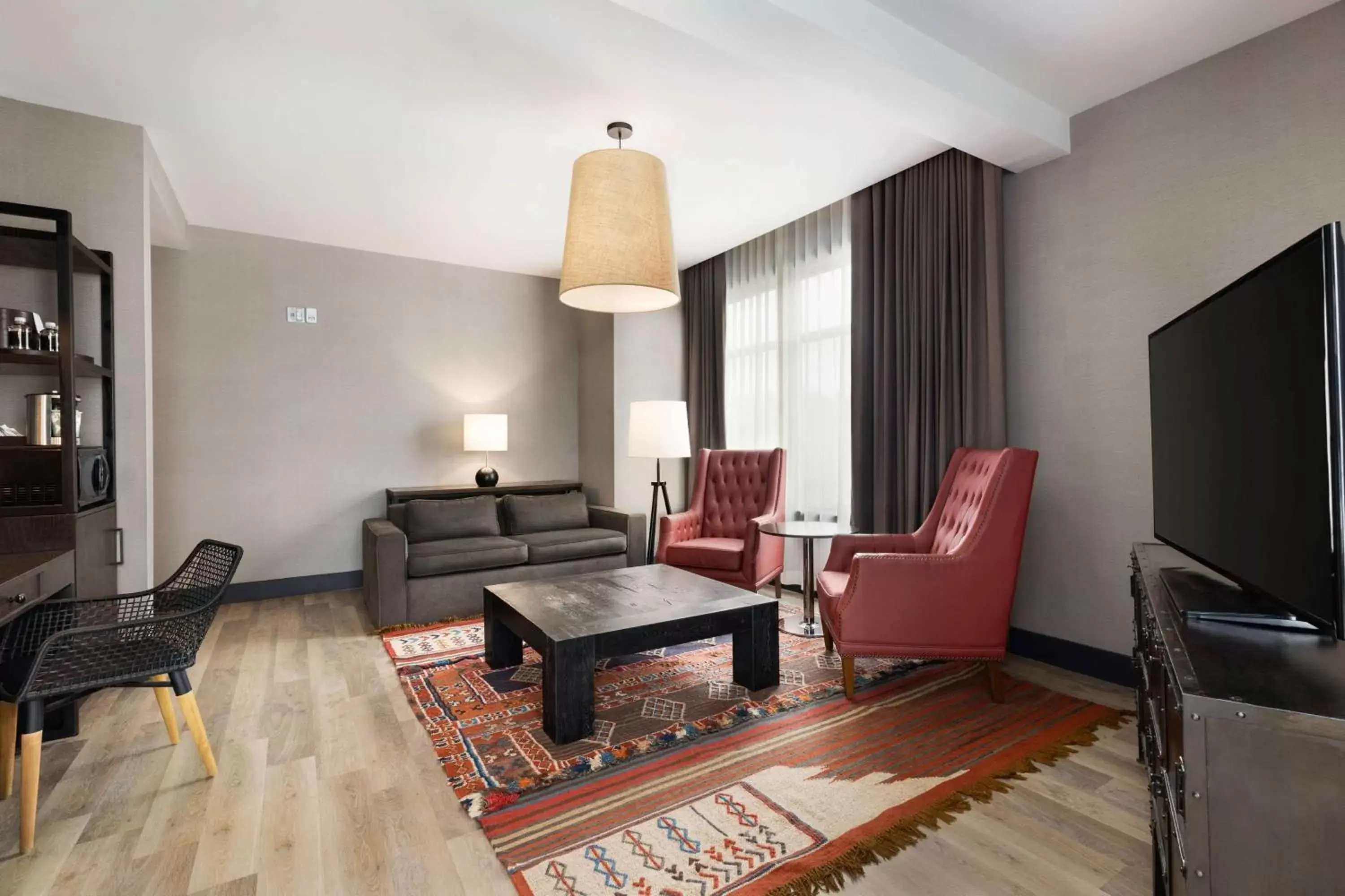 Bed, Seating Area in Origin Red Rocks, a Wyndham Hotel