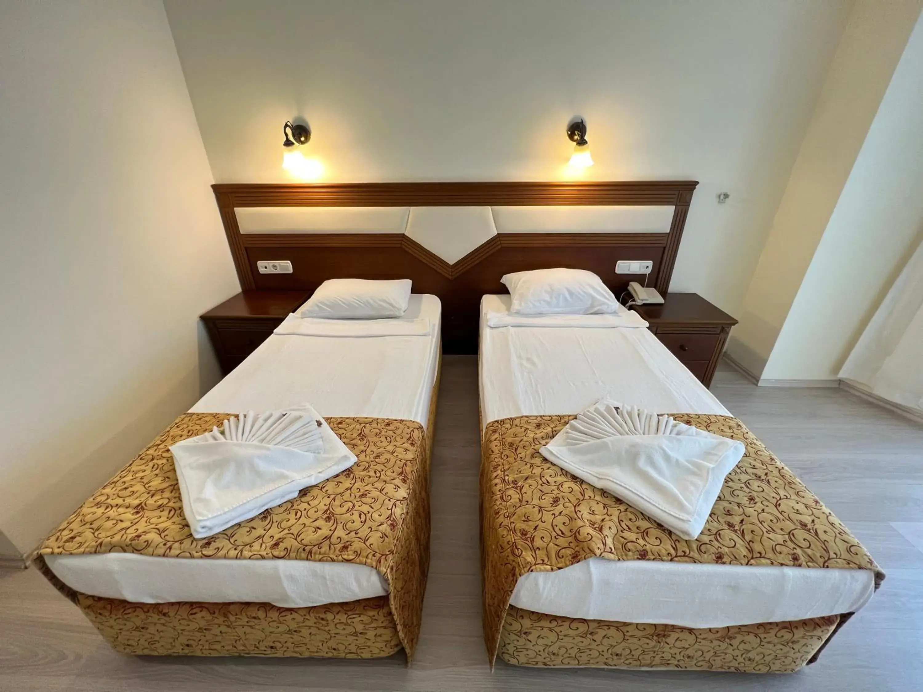 Bed in Valeri Beach Hotel