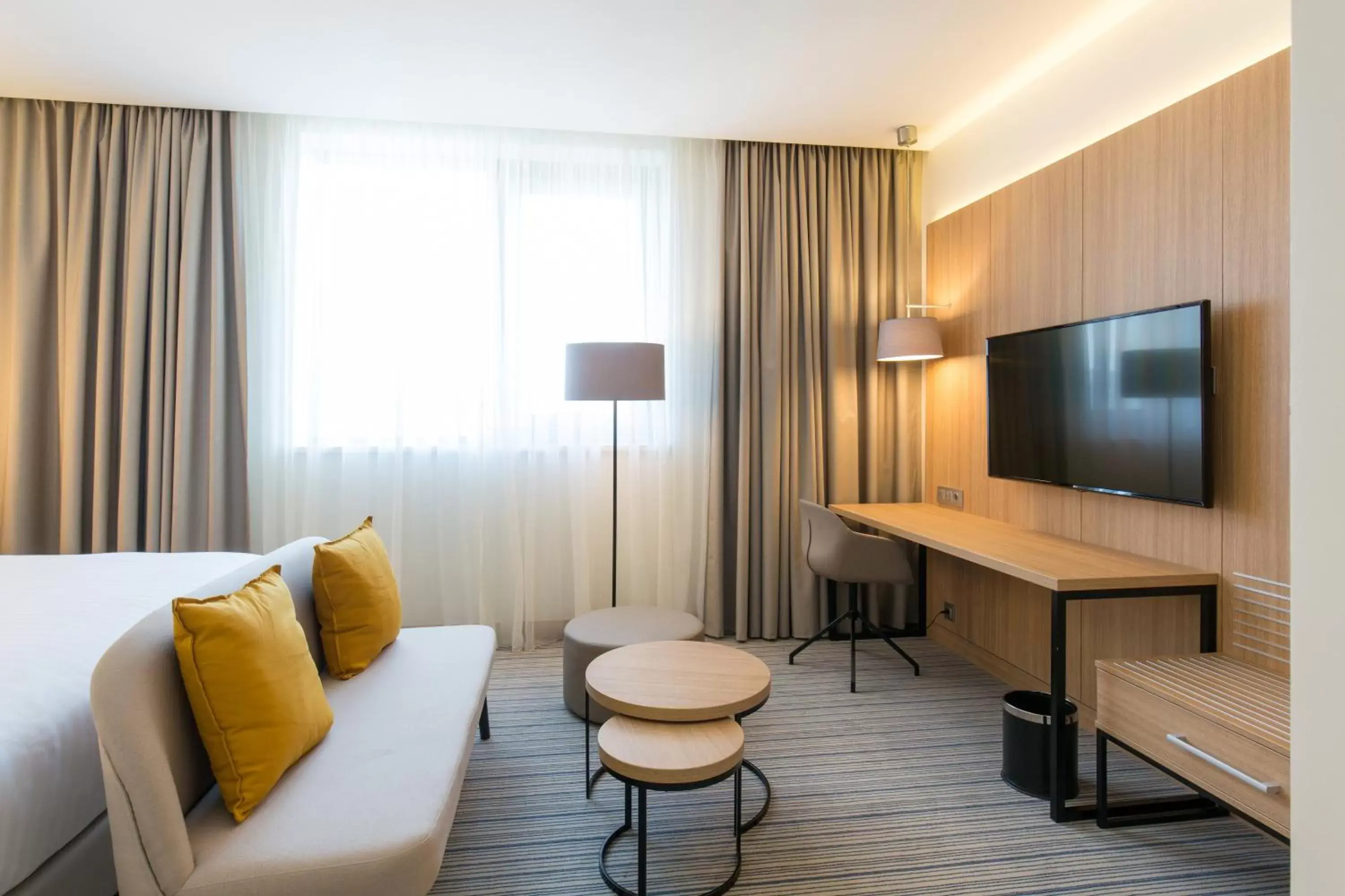 Bed, Seating Area in Courtyard by Marriott Banja Luka