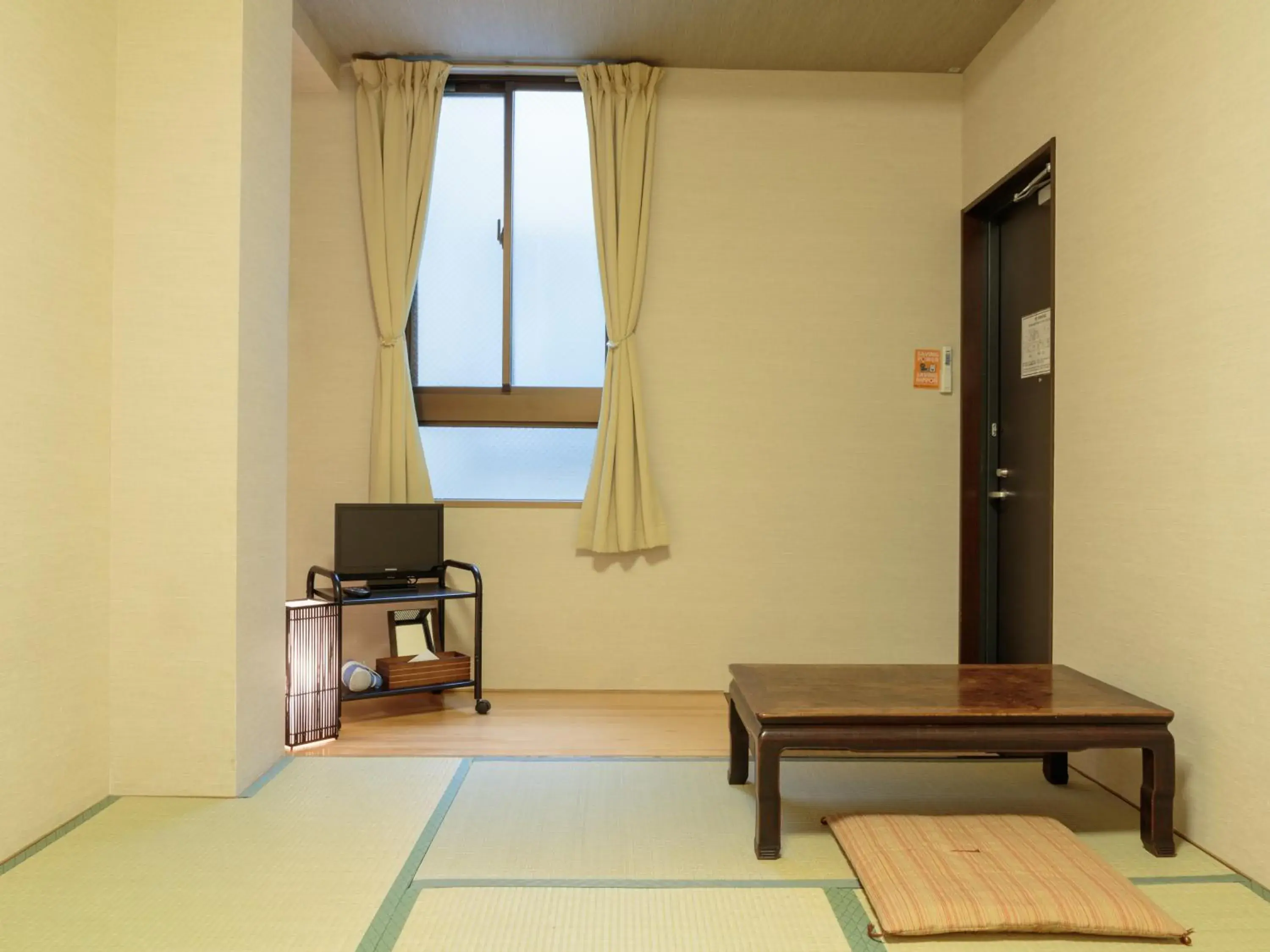 Photo of the whole room, Seating Area in Kyoto Hana Hostel