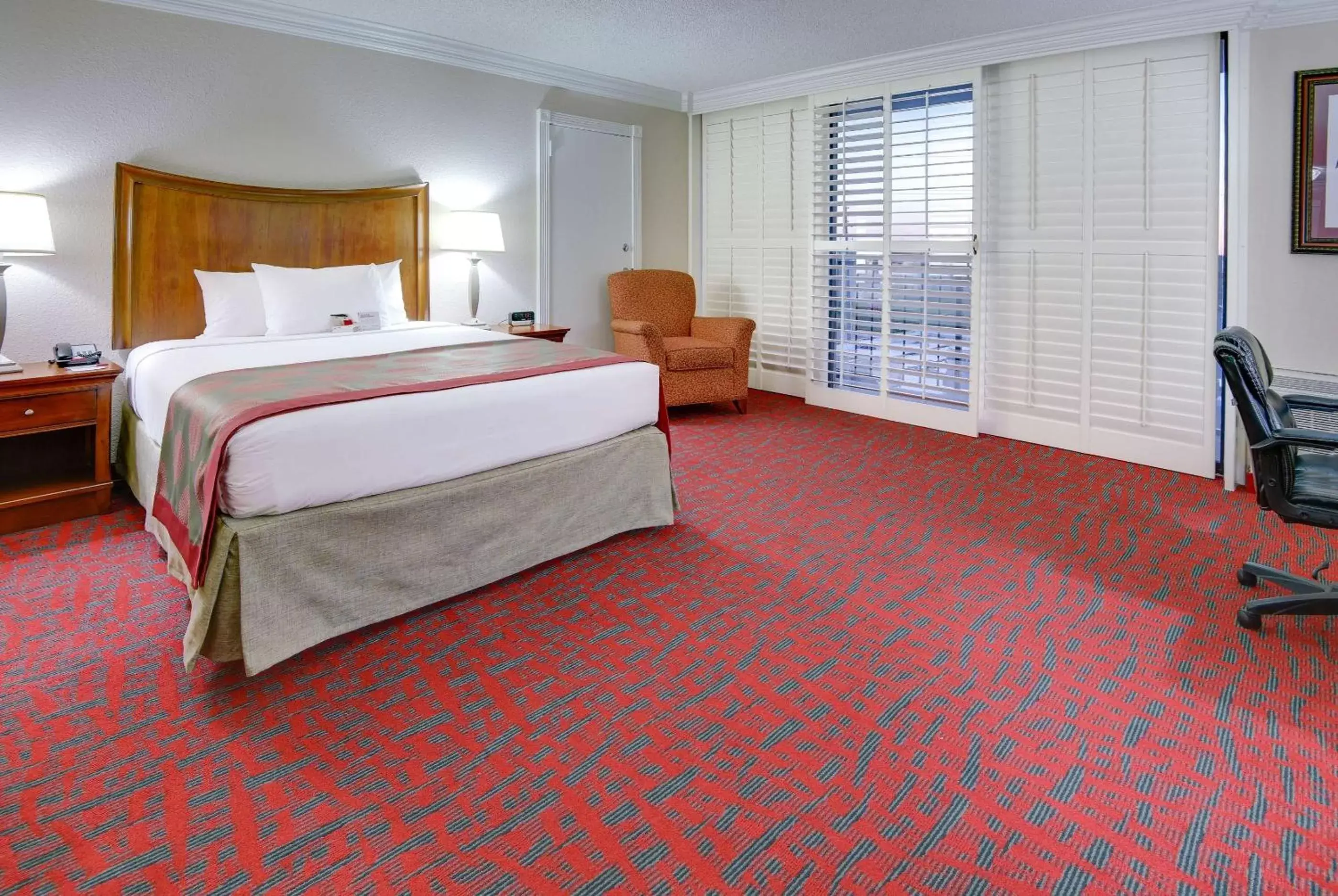 Photo of the whole room, Bed in Ramada by Wyndham Metairie New Orleans Airport Photo of the whole room, Bed in Ramada by Wyndham Metairie New Orleans Airport