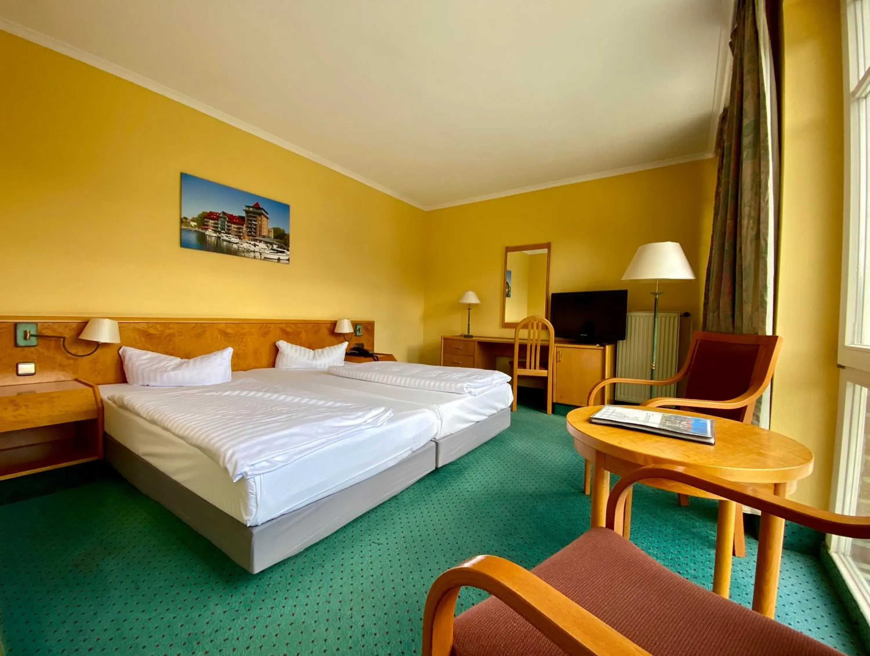 Photo of the whole room, Bed in Park Hotel Fasanerie Neustrelitz