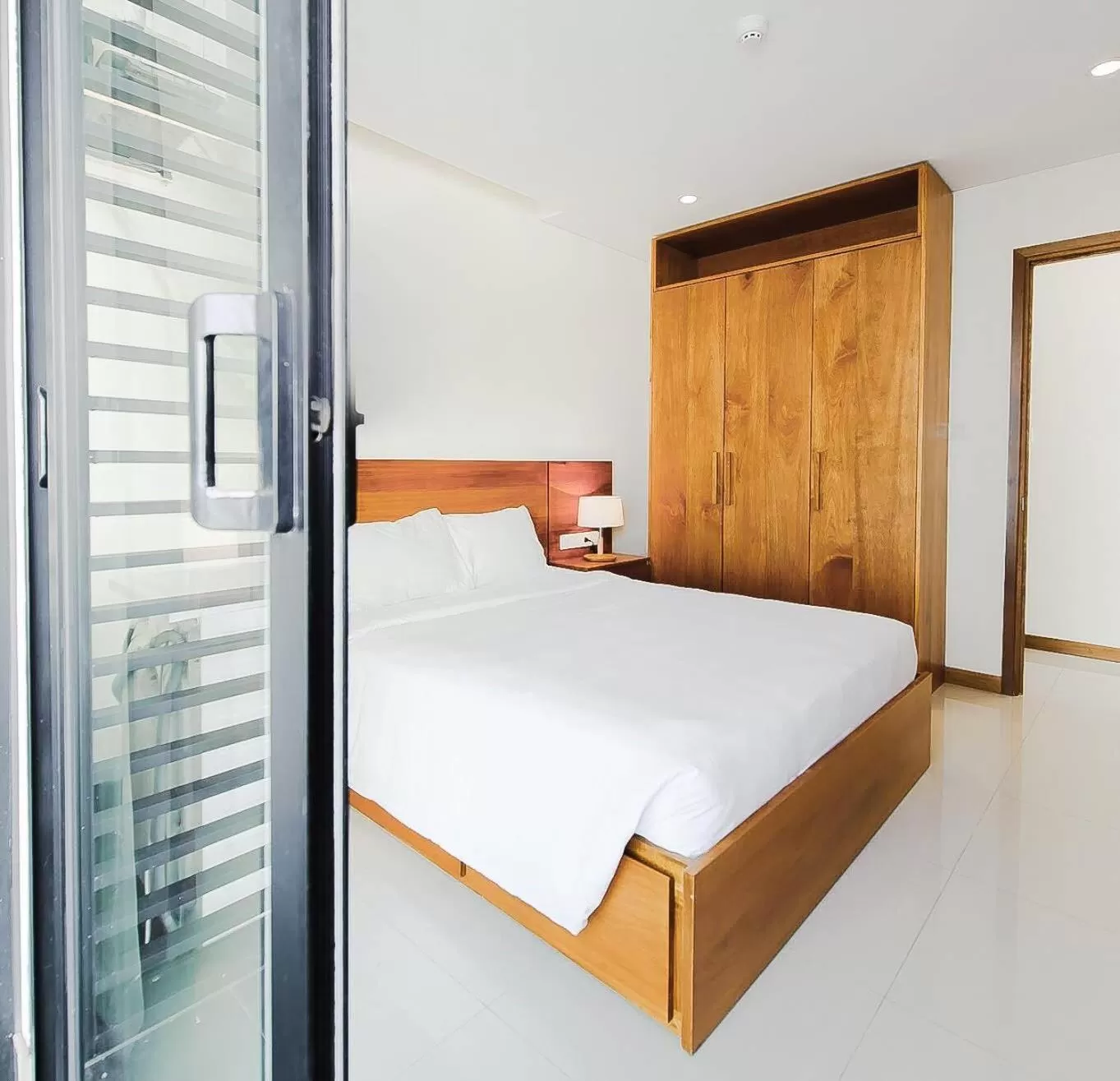 Bed in Maple Hotel & Apartment