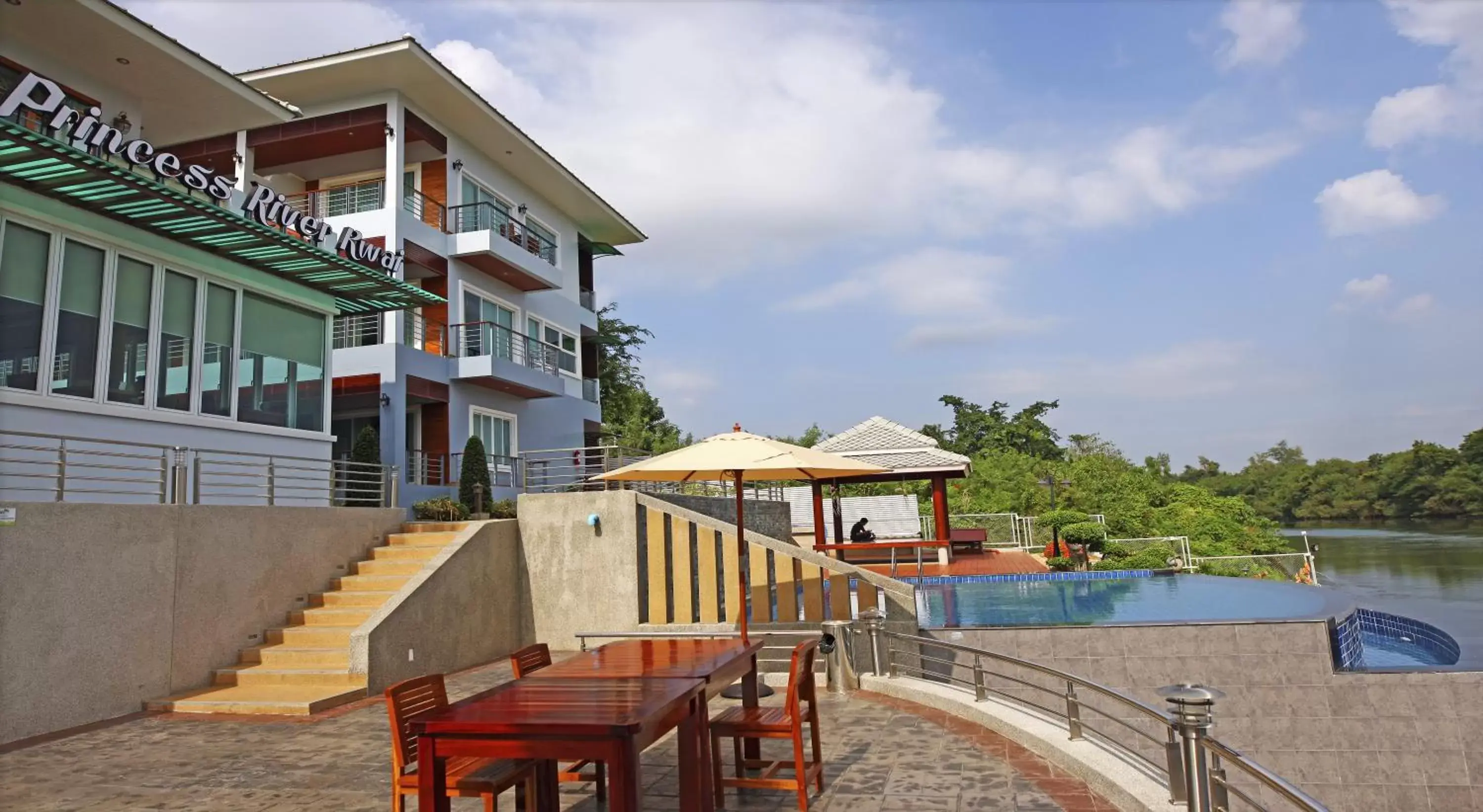 Swimming pool, Property Building in Princess River Kwai Hotel