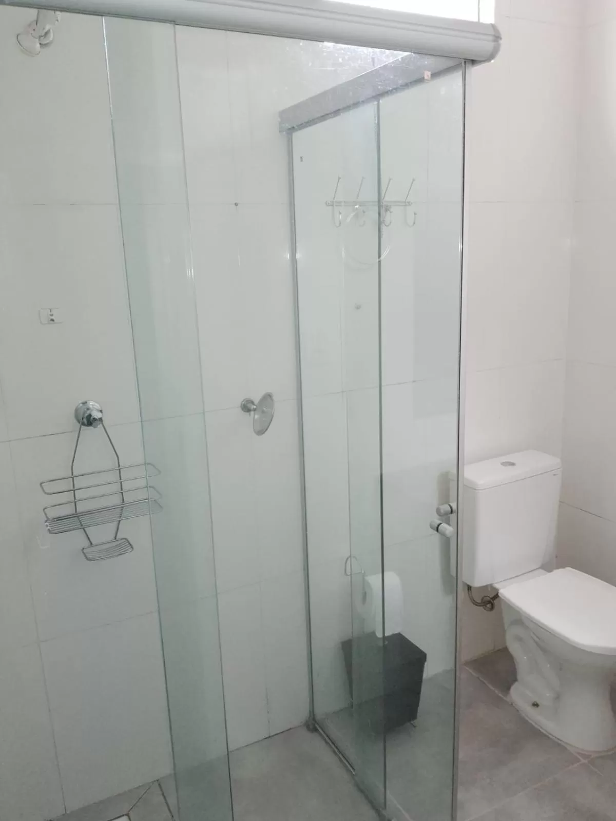 Bathroom in Pousada da Gi Suítes e Turismo