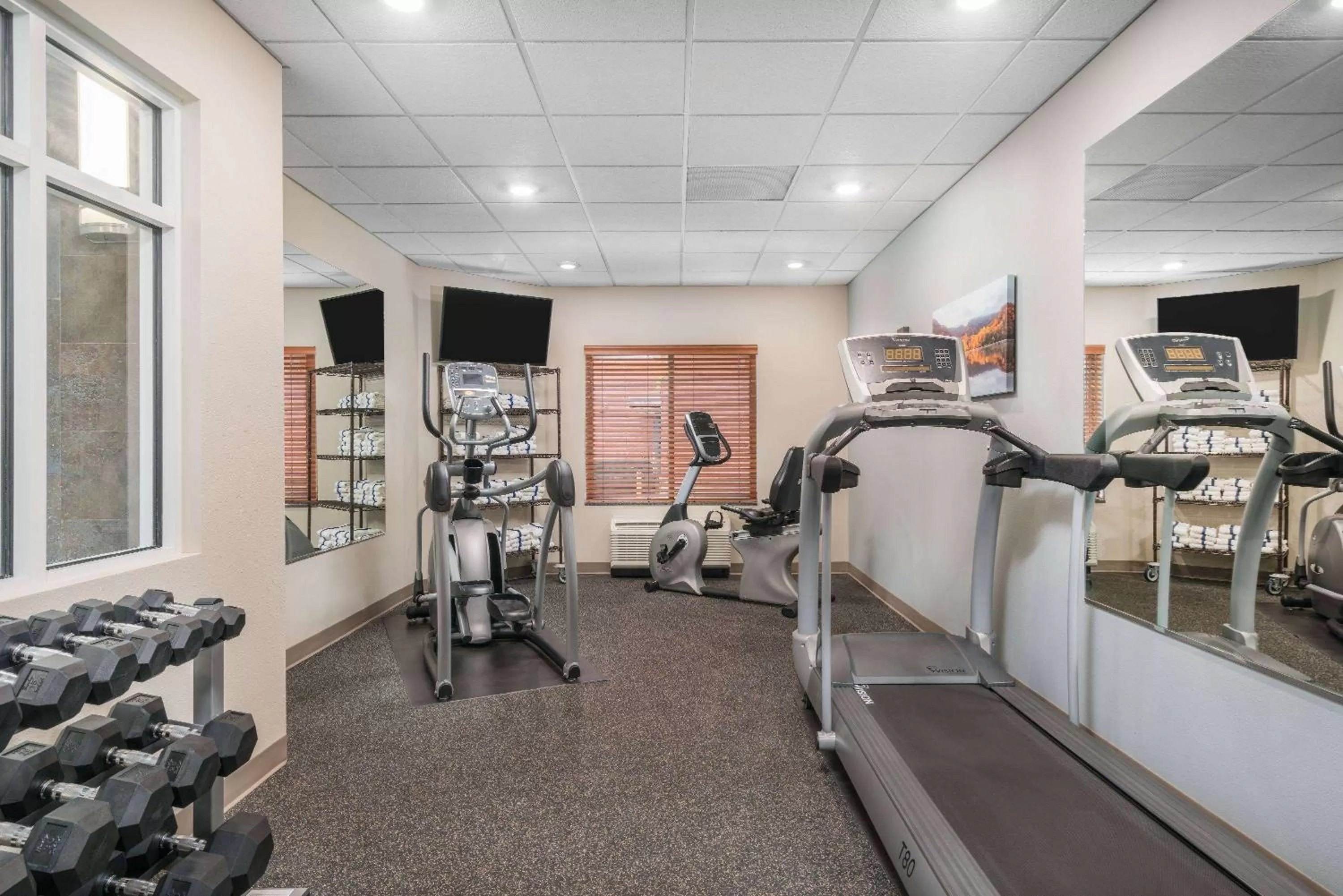 Fitness centre/facilities in AmericInn by Wyndham Winona
