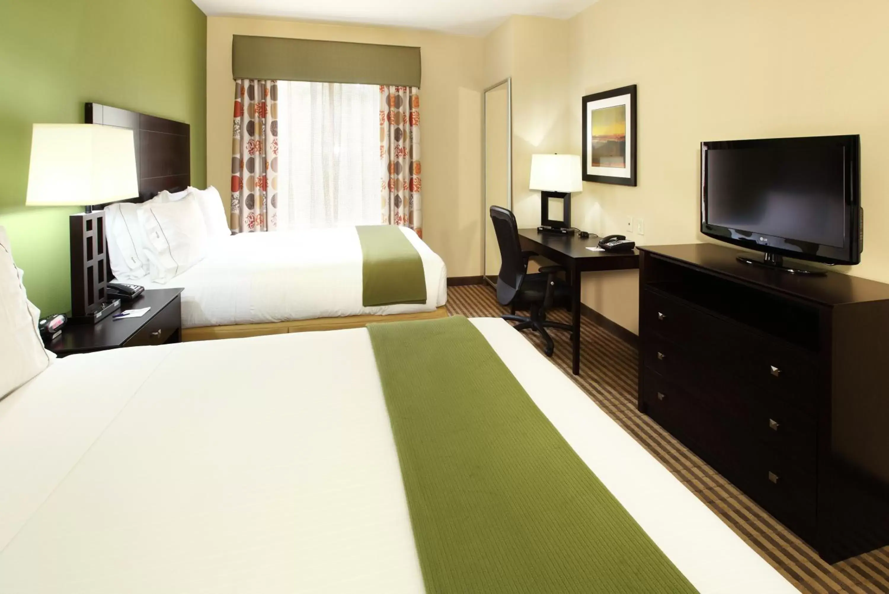 Photo of the whole room, TV/Entertainment Center in Holiday Inn Express & Suites Maumelle, an IHG Hotel