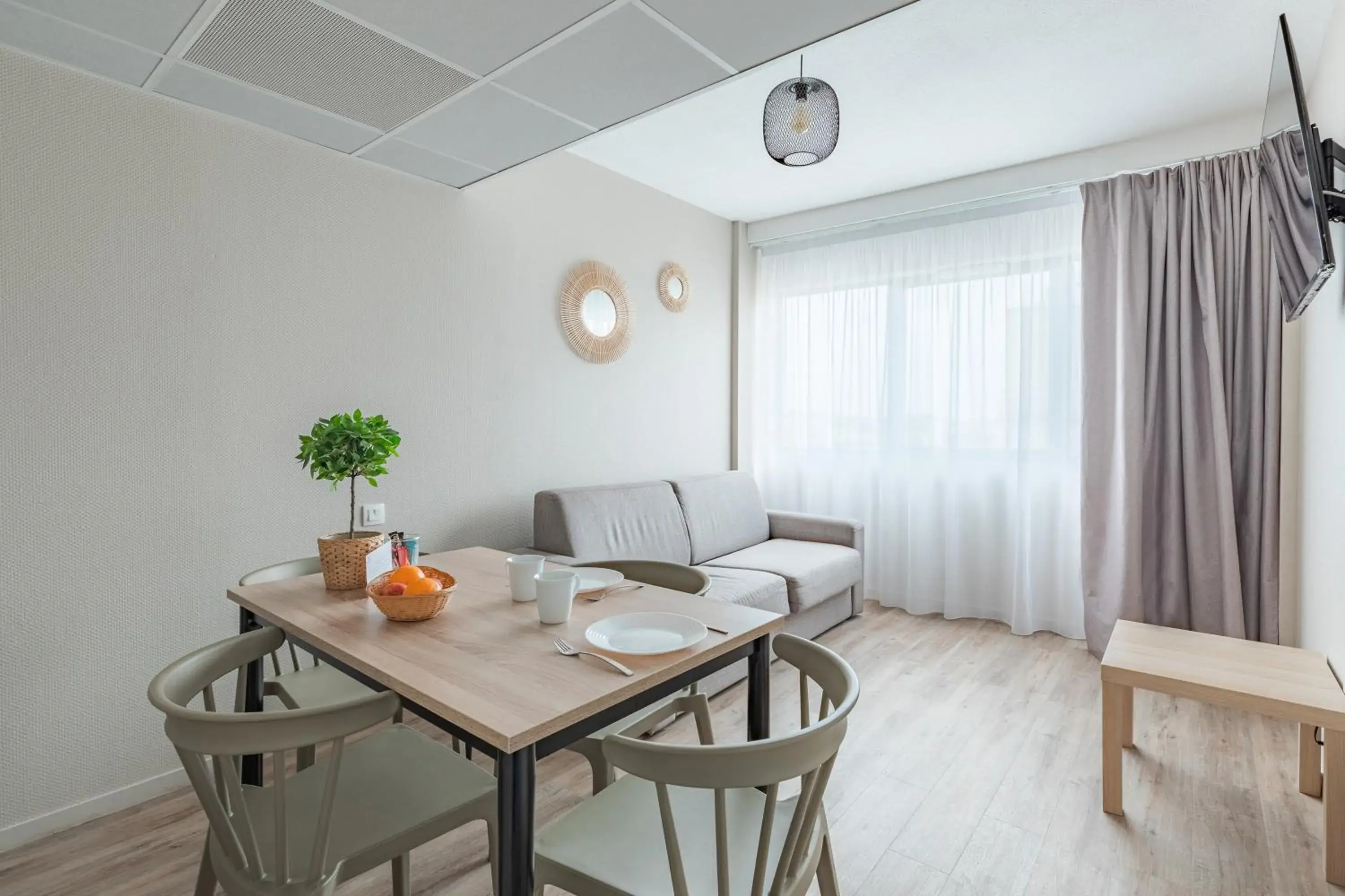 Living room, Dining Area in Appart City Bordeaux Centre